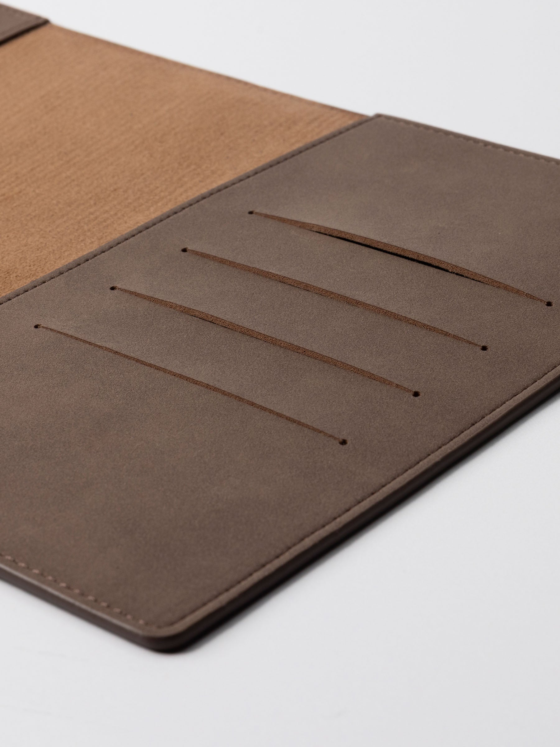 Closeup of folio. Four credit card slots are visible. Color shown is Espresso.