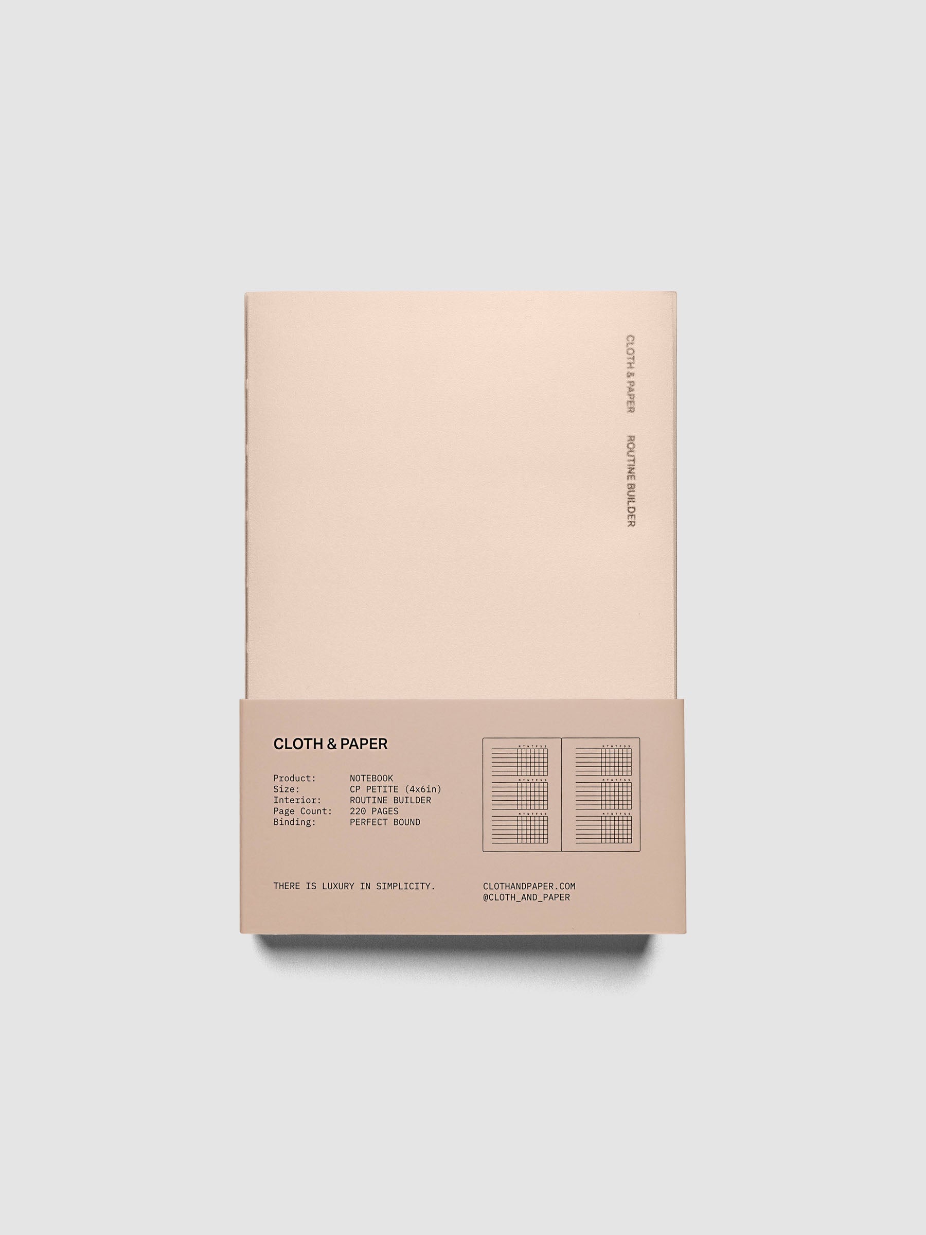Perfect Bound Notebook | CP Petite | Routine Builder shown closed on a neutral background, blush cover with a printed layout key