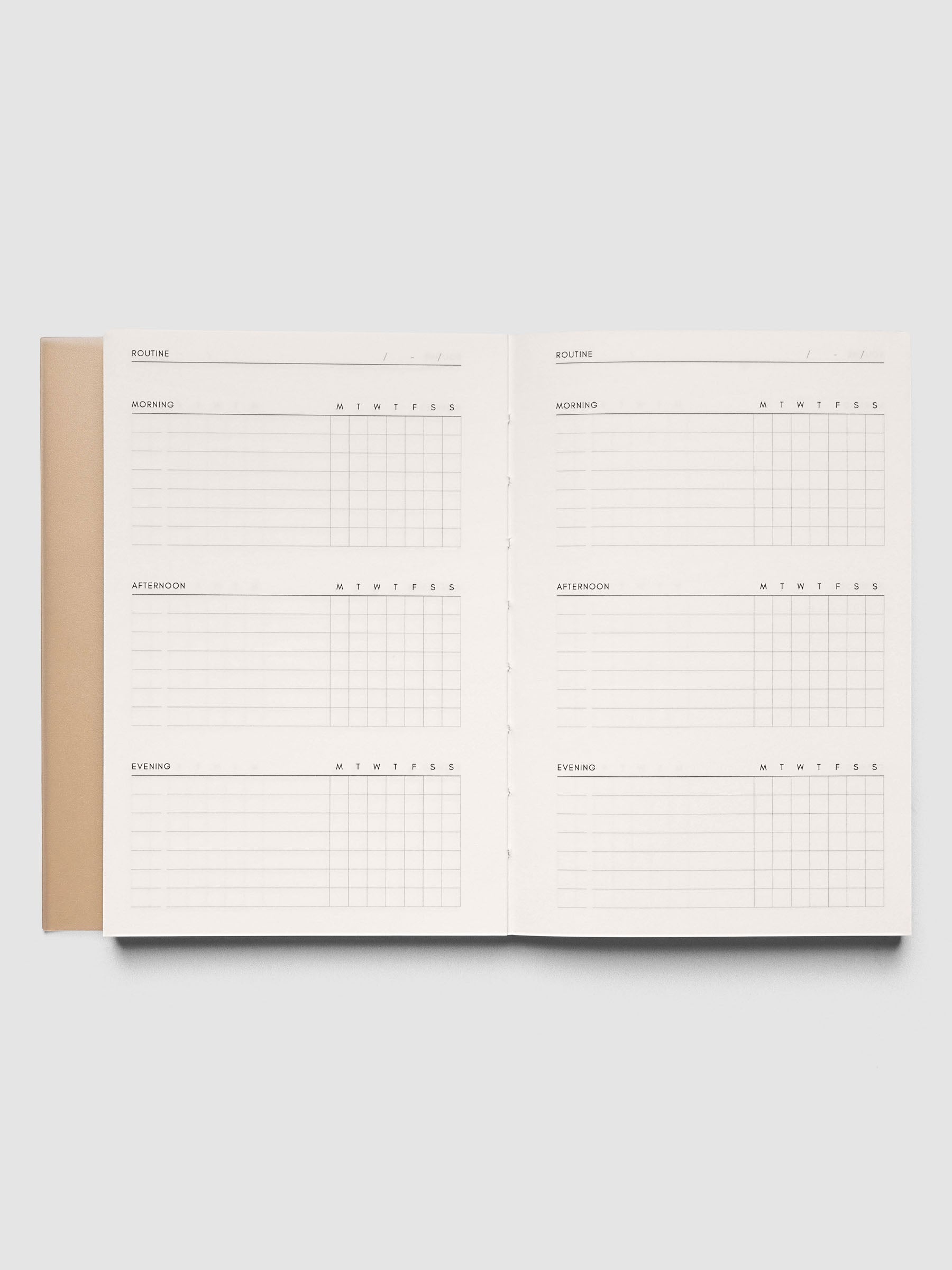 Perfect Bound Notebook | CP Petite | Routine Builder shown open and laid flat, both pages showing the routine layout in columns