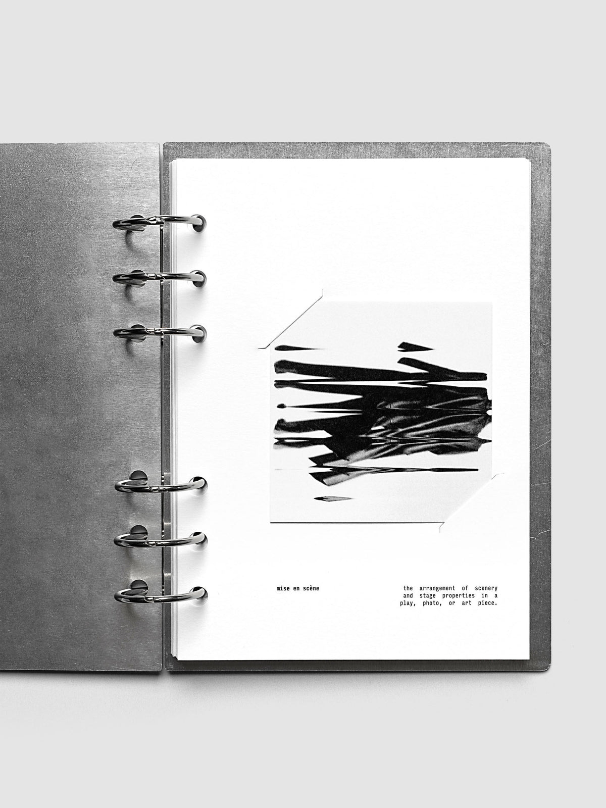 Mise En Scene Dashboard inside the silver clad covers on a light gray background in the Personal Wide size.