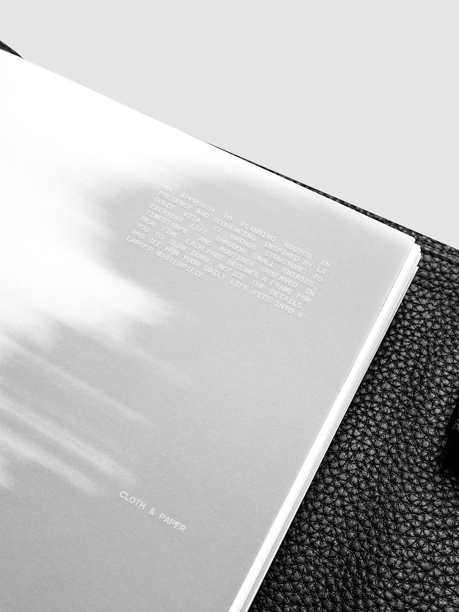 La Dolce Vita Dashboard Duo in A5 6-Ring Punch, a vellum overlay printed in white ink with silver foil layered over a soft gray gradient cardstock base on a light gray background