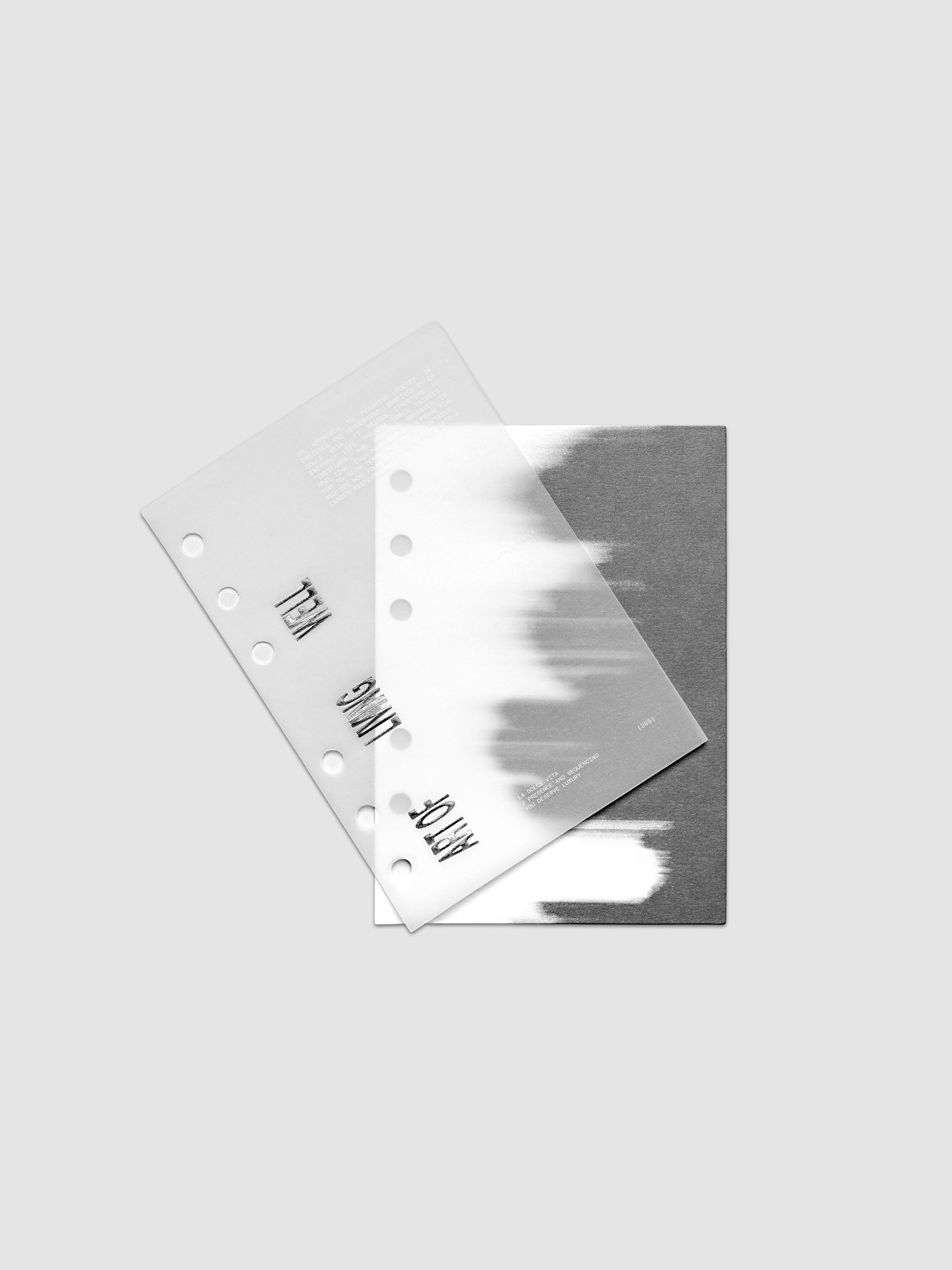 La Dolce Vita Dashboard Duo in A6 6-Ring Punch, a vellum overlay printed in white ink with silver foil layered over a soft gray gradient cardstock base on a light gray background