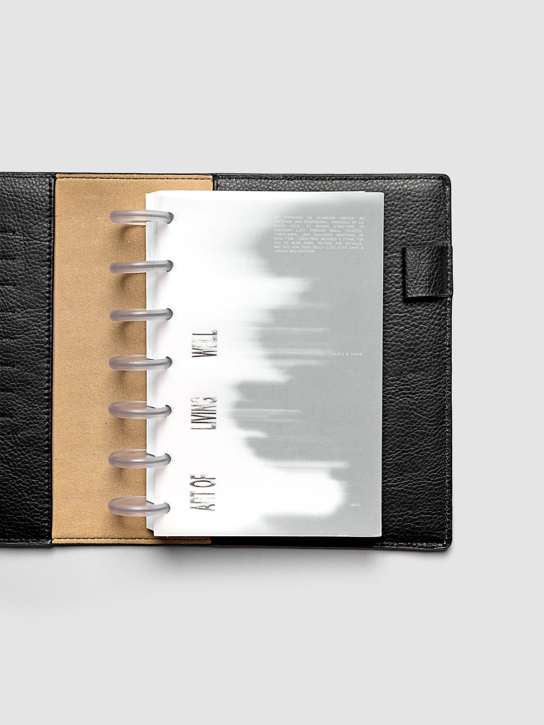 La Dolce Vita Dashboard Duo in HP Mini 7-Disc Punch, a vellum overlay printed in white ink with silver foil layered over a soft gray gradient cardstock base on a light gray background