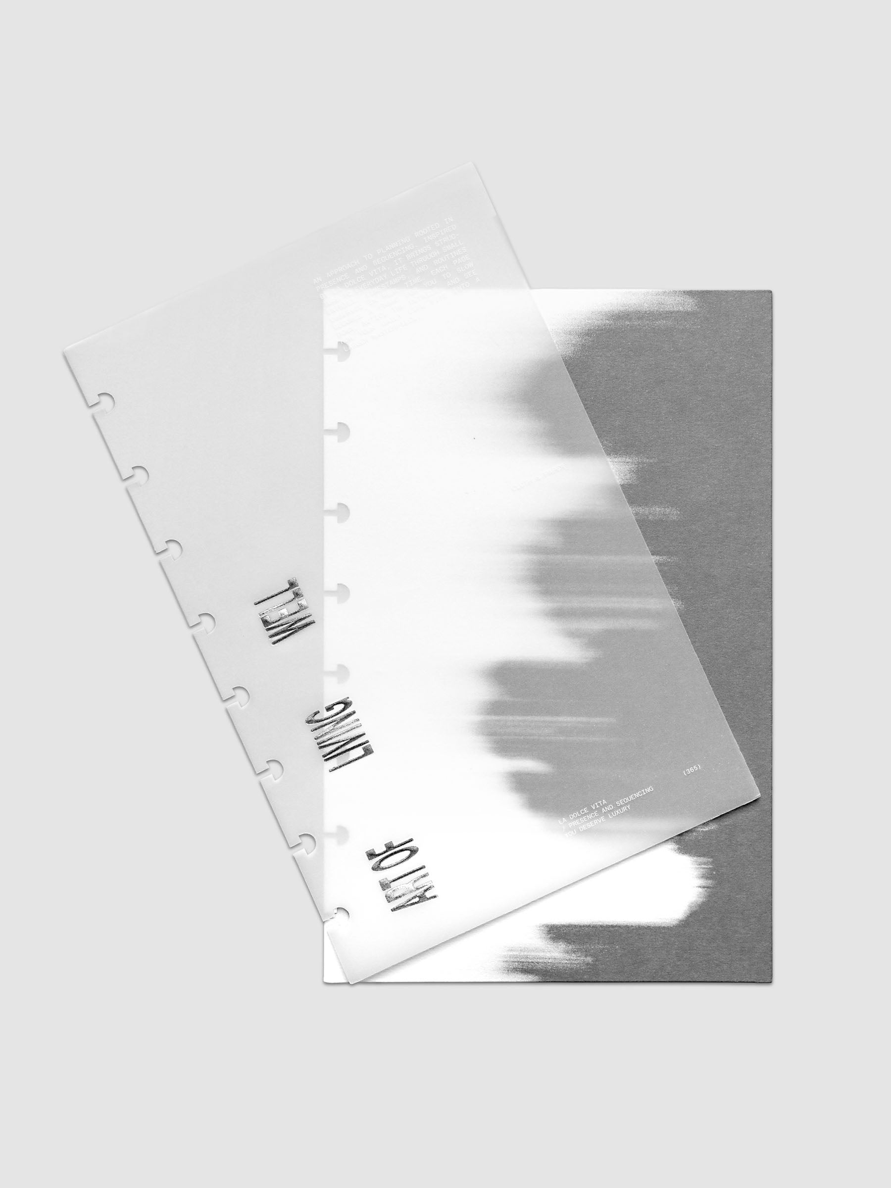 La Dolce Vita Dashboard Duo in Half Letter 8-Disc Punch, a vellum overlay printed in white ink with silver foil layered over a soft gray gradient cardstock base on a light gray background