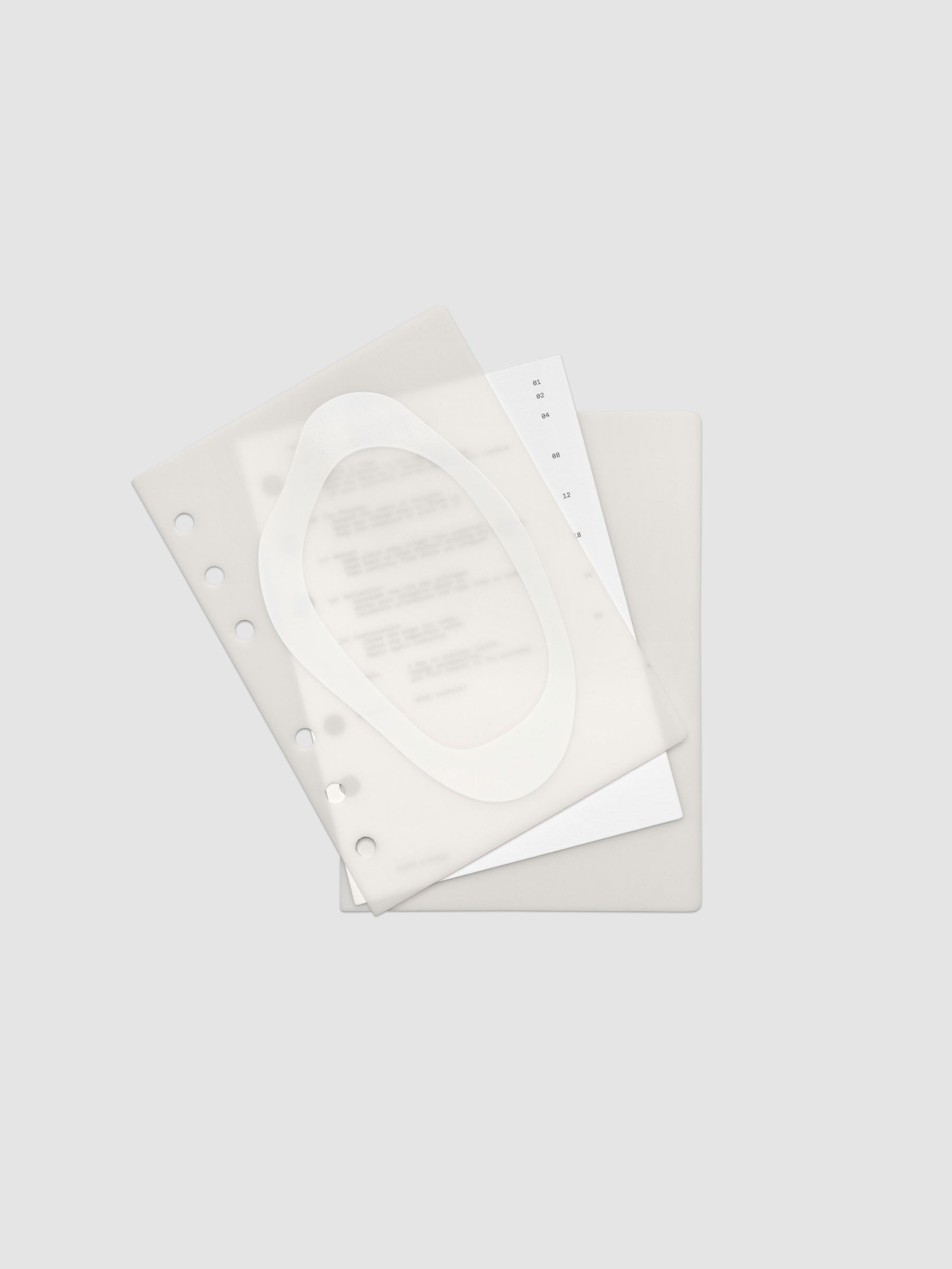 Continuation Planner Cover + Dashboard Set in A6. Milky white frosted plastic cover with a spot gloss organic shape over a black-printed paper dashboard. Image 1 of 3.