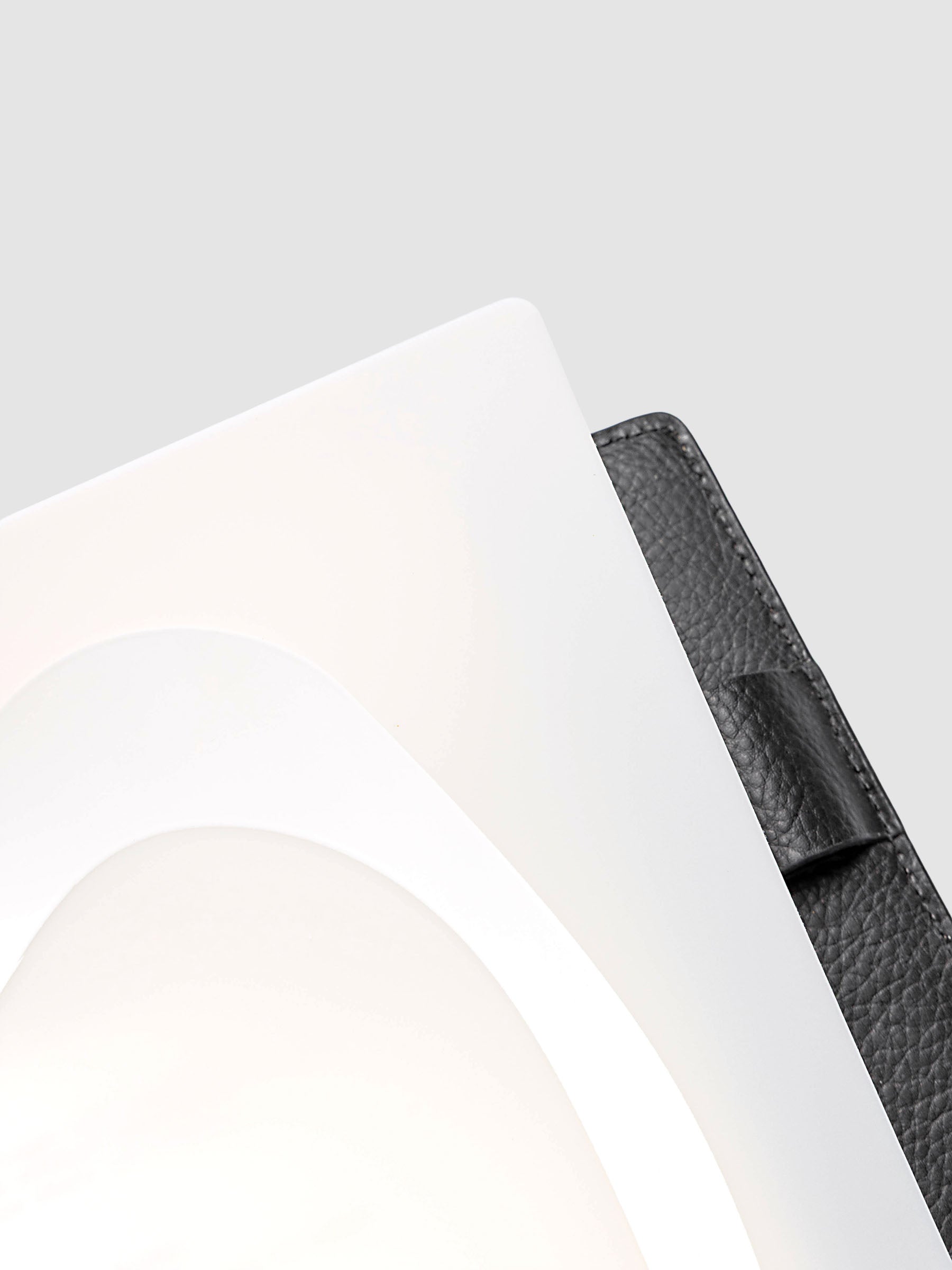 Continuation Planner Cover + Dashboard Set in Half Letter 8-Disc Punch. Milky white frosted plastic cover with a spot gloss organic shape over a black-printed paper dashboard. Image 4 of 6.