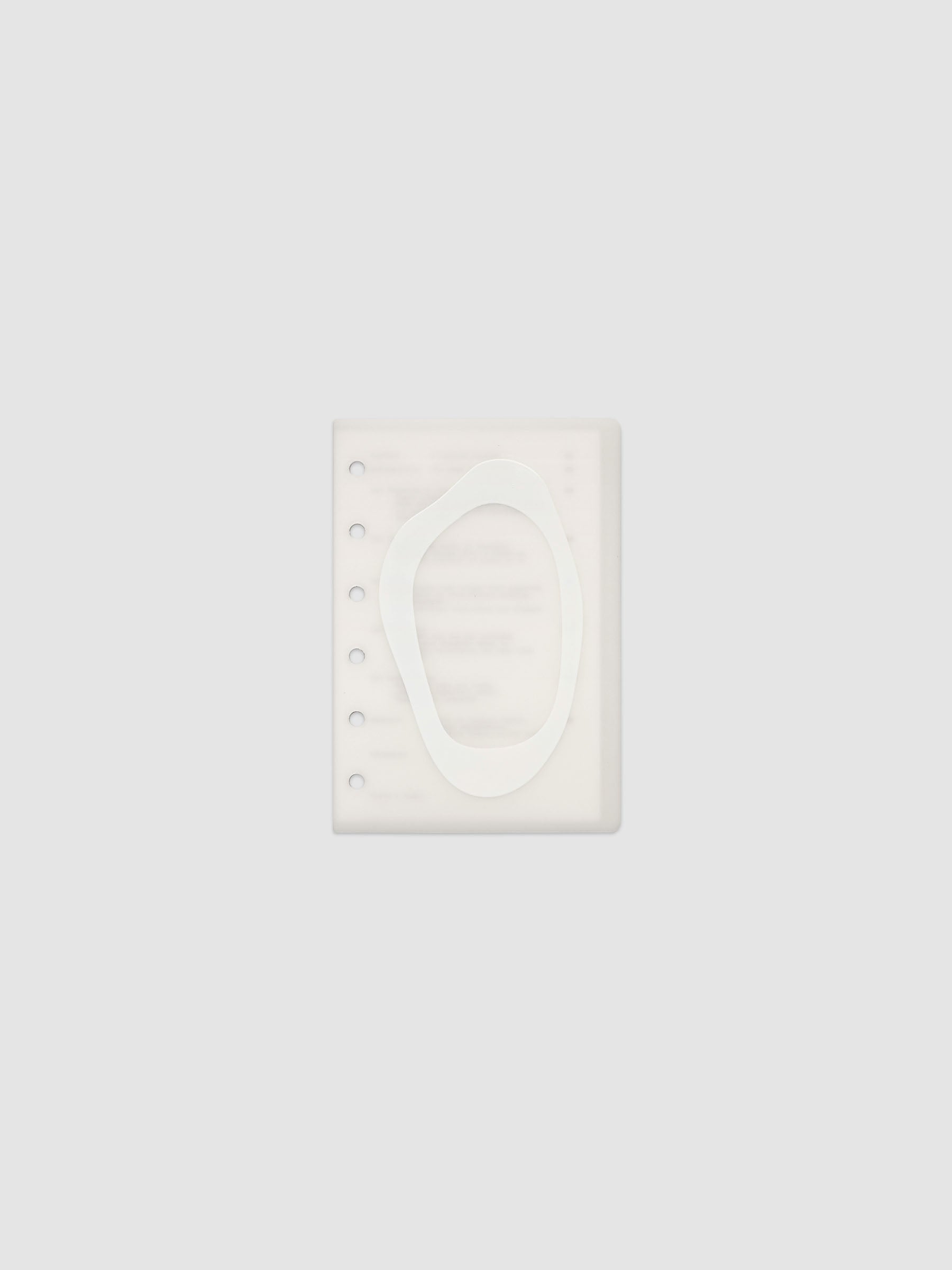 Continuation Planner Cover + Dashboard Set in Pocket. Milky white frosted plastic cover with a spot gloss organic shape over a black-printed paper dashboard. Image 1 of 3.