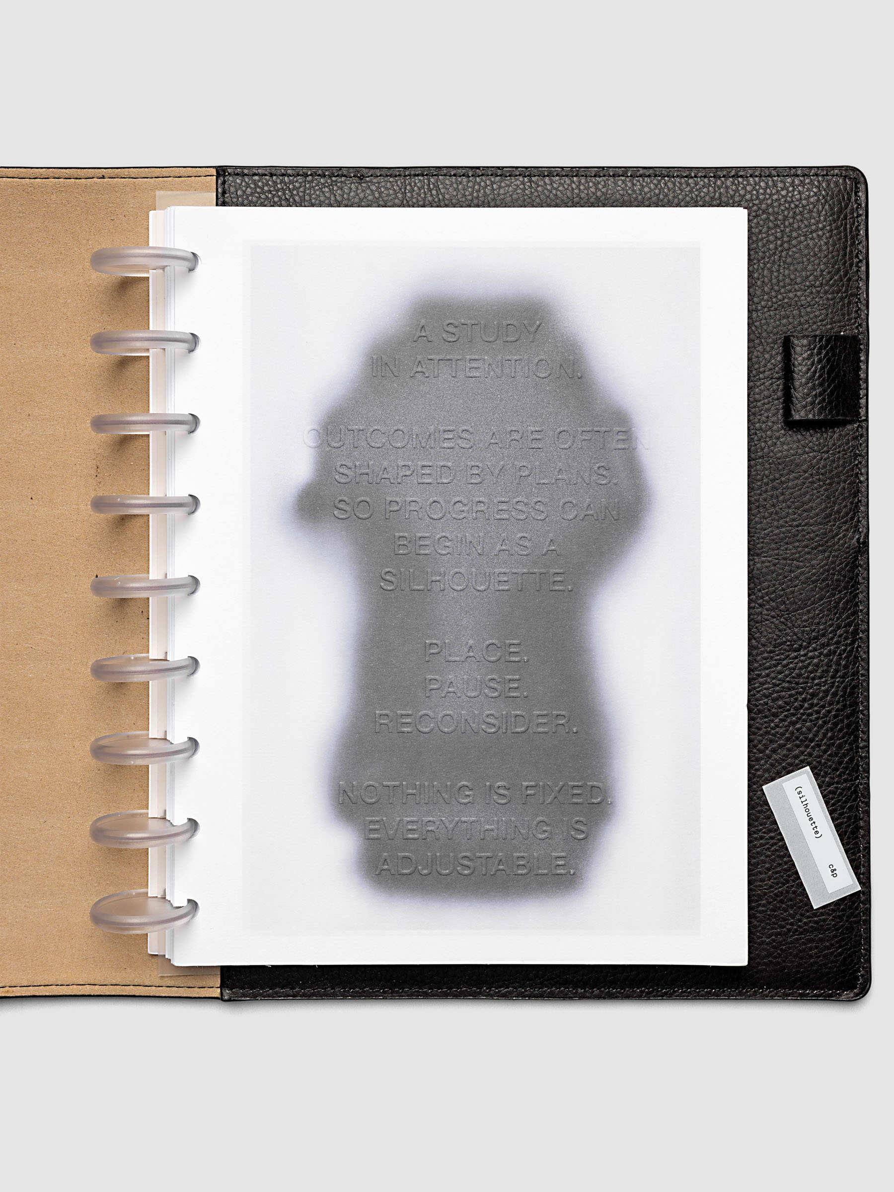 Silhouette Planner Dashboard in HP Classic. Greyscale silhouette print with embossed text on paper. Image 2 of 2.