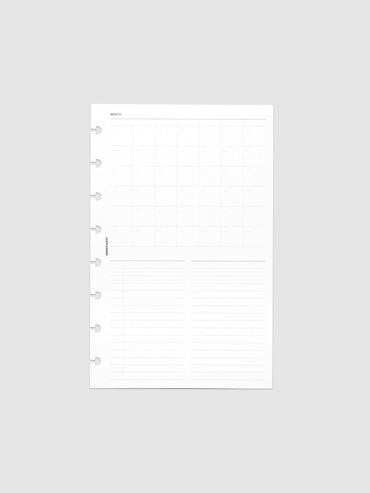 Monthly Fold Out Planner Insert Set of 2, Half Letter 8-Disc Punch, one white insert folded closed and photographed flat, eight disc notches down the left edge