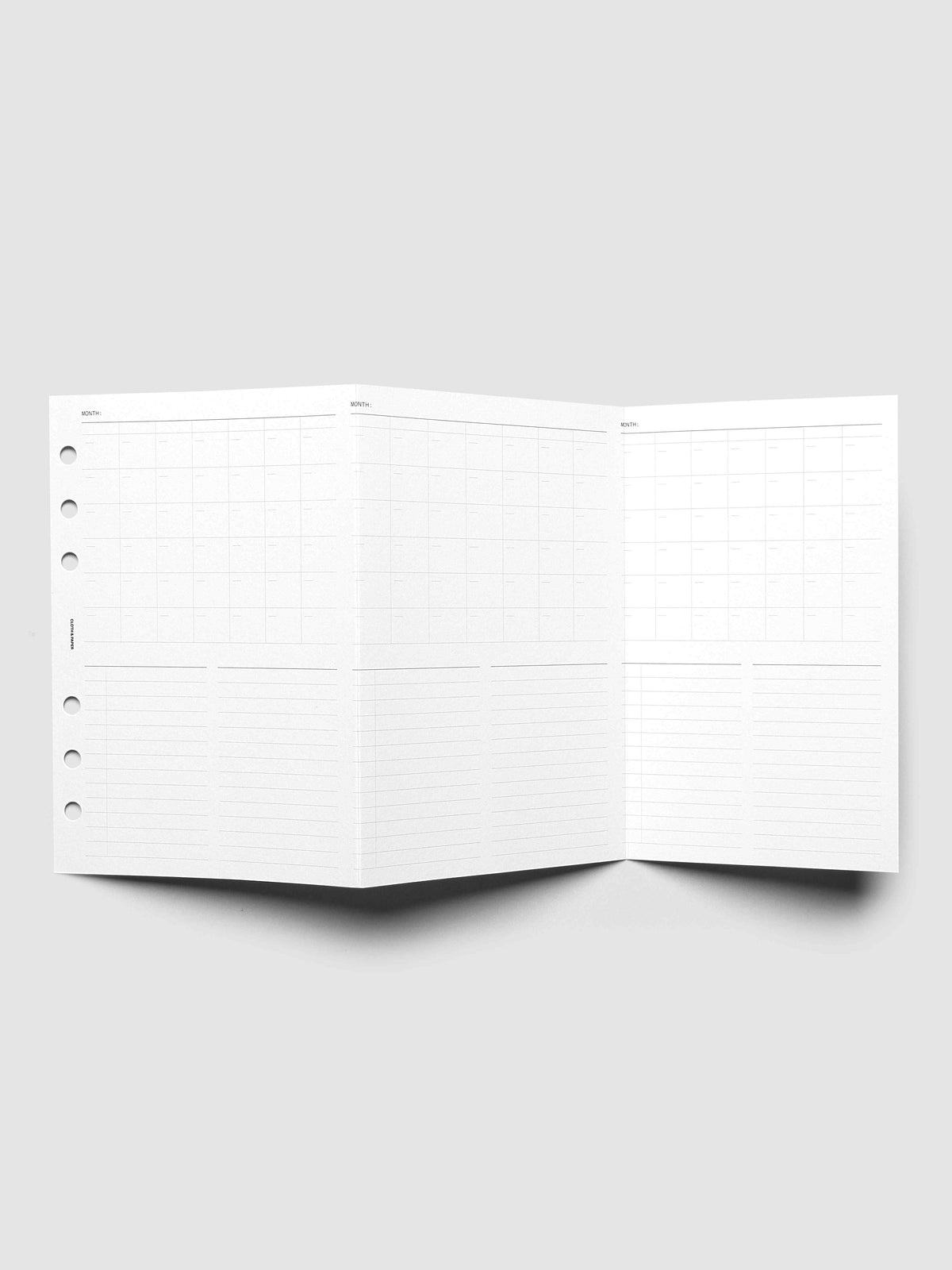 Monthly Fold Out Planner Insert Set of 2, Personal Wide 6-Ring Punch, the insert unfolded and standing open, three monthly panels shown across the width