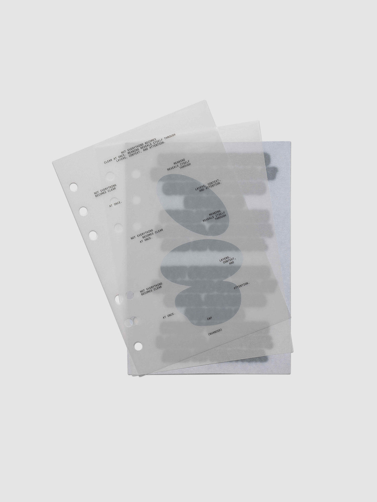 Nuanced Dashboard Trio, Personal Wide 6-Ring Punch, the three dashboards fanned so each layer of grey printing shows through the one above