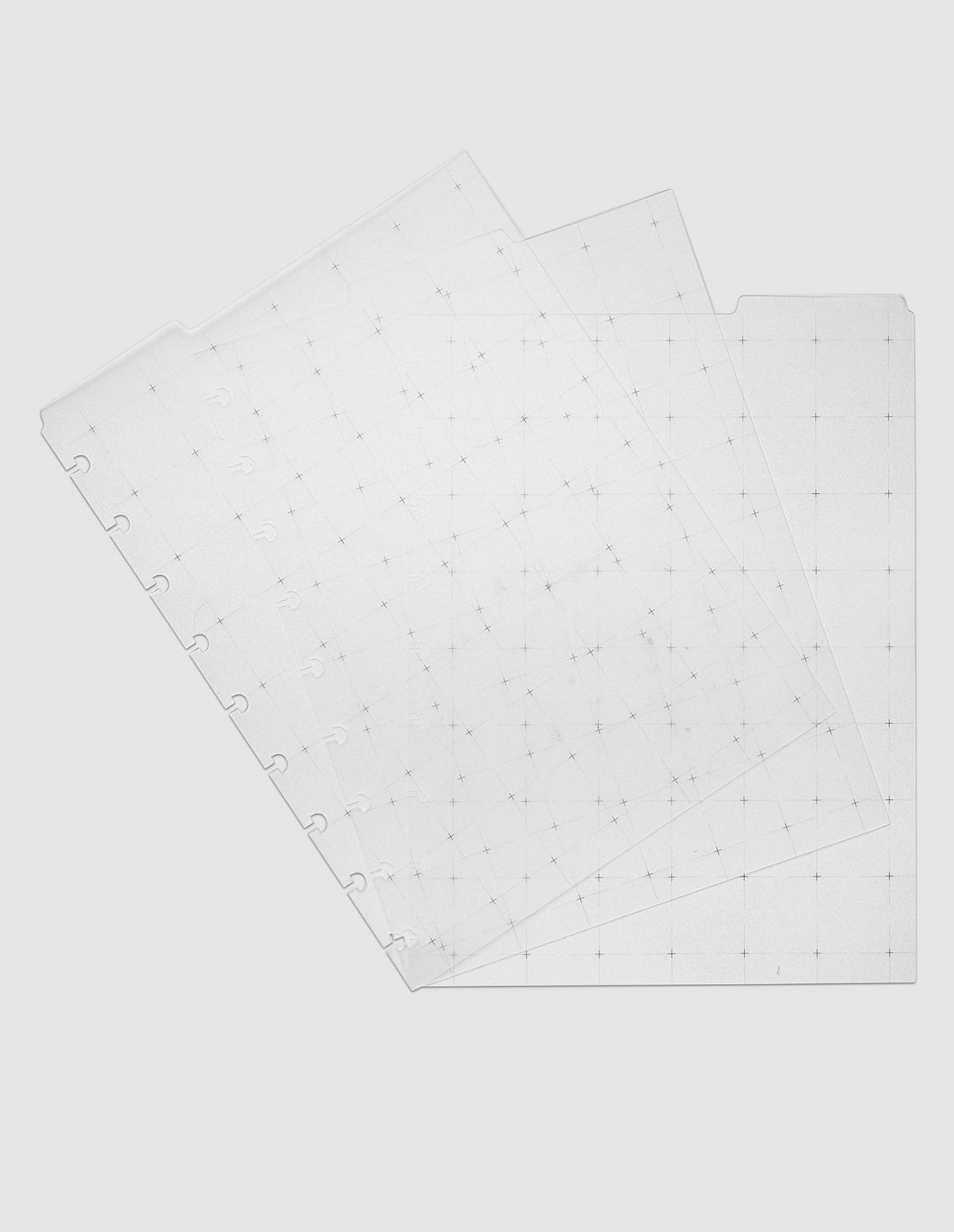 Grid Top Tab Dividers | Ultra-Thin, HP Classic 9-Disc Punch, the three dividers fanned at an angle, black crosshair grid print carrying across the overlapping translucent sheets
