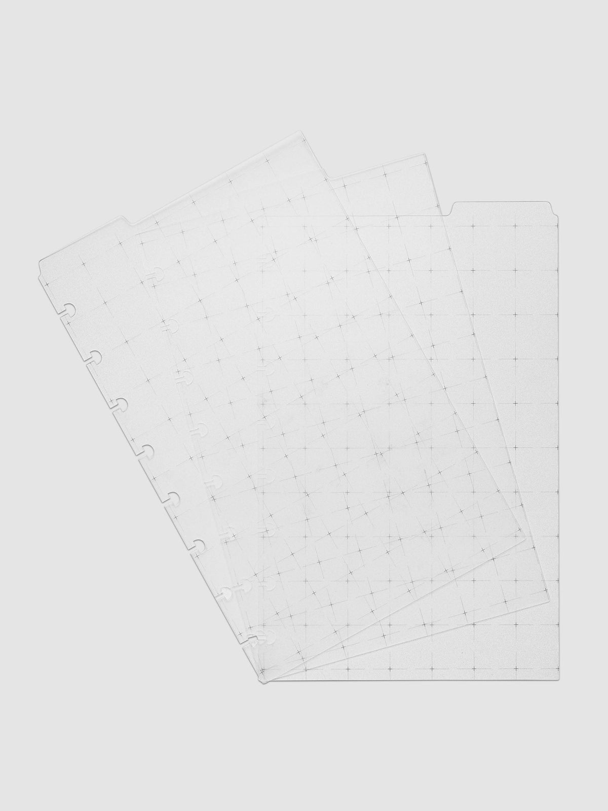 Grid Top Tab Dividers | Ultra-Thin, Half Letter 8-Disc Punch, the three dividers fanned across the frame so each tab position is visible, black grid print reading through the overlapping sheets