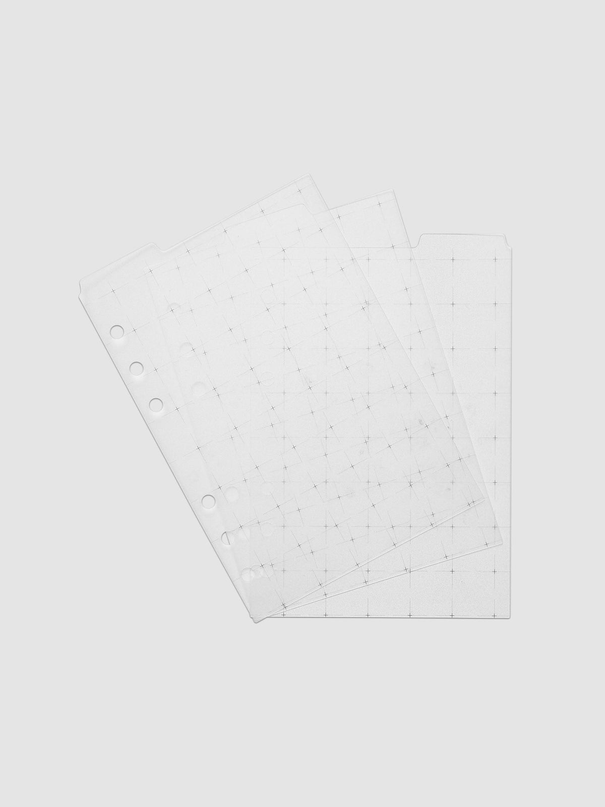Grid Top Tab Dividers | Ultra-Thin, Personal Wide 6-Ring Punch, the three dividers fanned across the frame so each tab reads separately against the pale grey ground