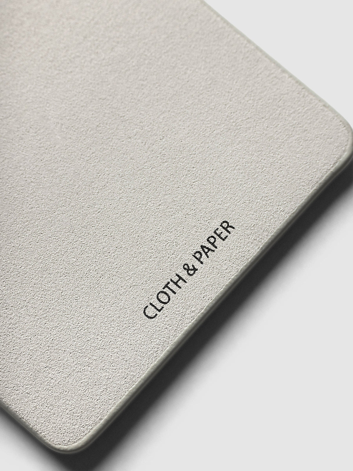 Magnetic Bookmarks Punched Holes & Margin, close-up of the fabric lining with the Cloth & Paper mark