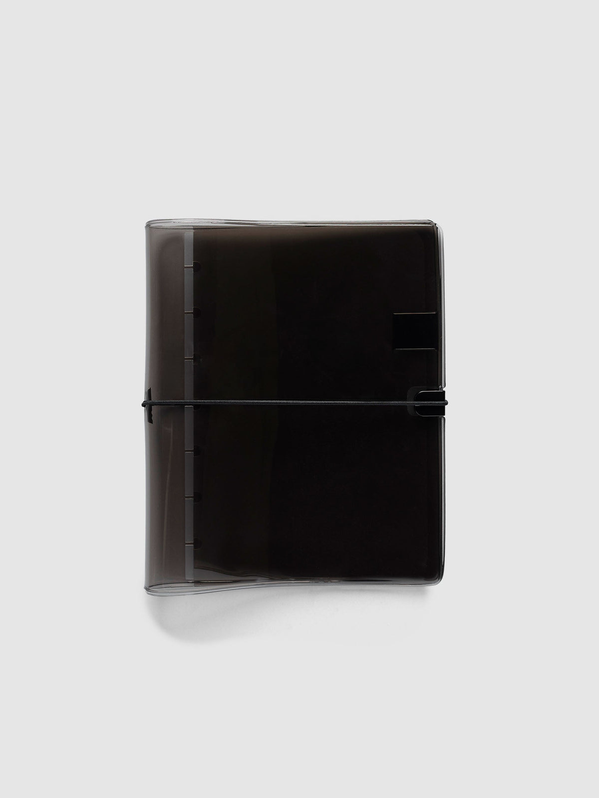Folio Cover in black tinted vinyl, Small (HP Mini 7-Disc Punch), closed with a black bungee cord hooked to a black clip