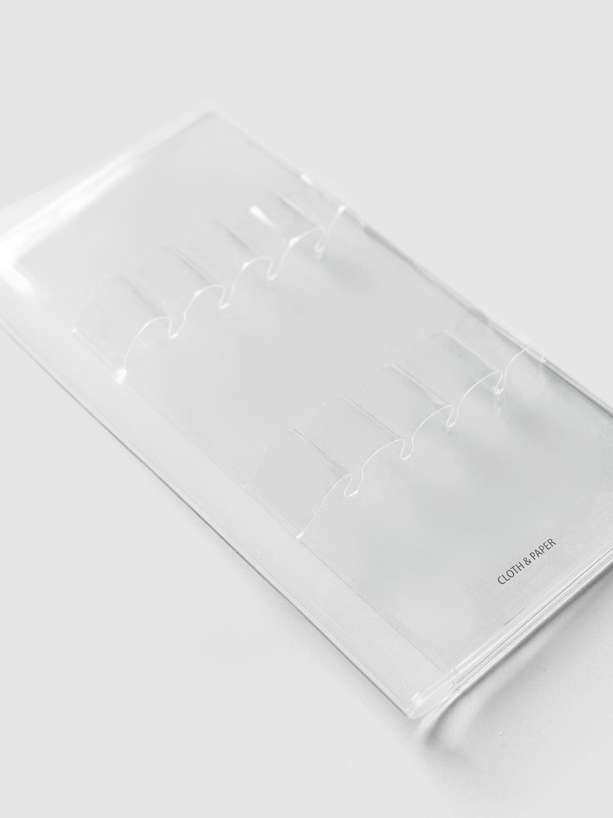 Angled close-up of the clear vinyl pen loops on the Travel Tool Kit, A5 Slim