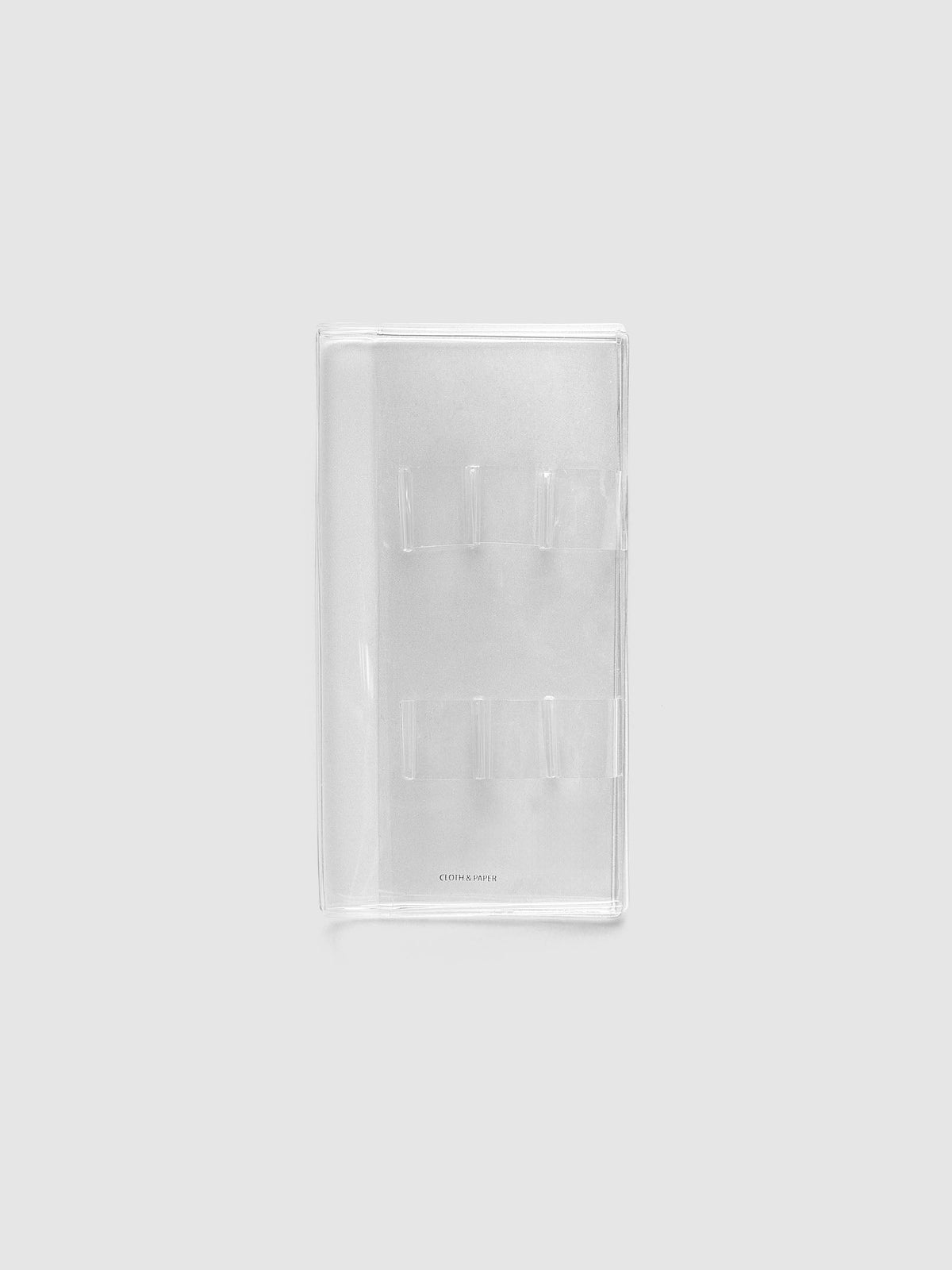 Travel Tool Kit, Pocket Plus, in clear vinyl, folded closed with two rows of clear pen loops and the Cloth & Paper logo