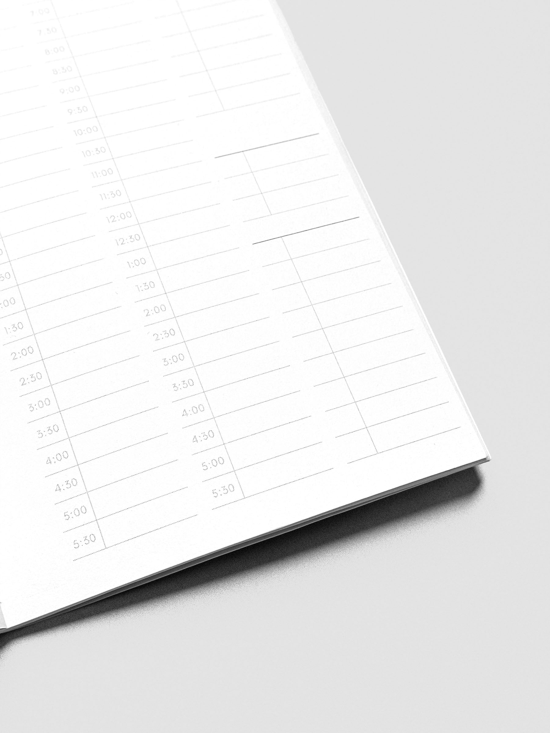 Travel Journal in size Pocket Plus in color Bordeux with 30 Minute Time Block pages shown close up.