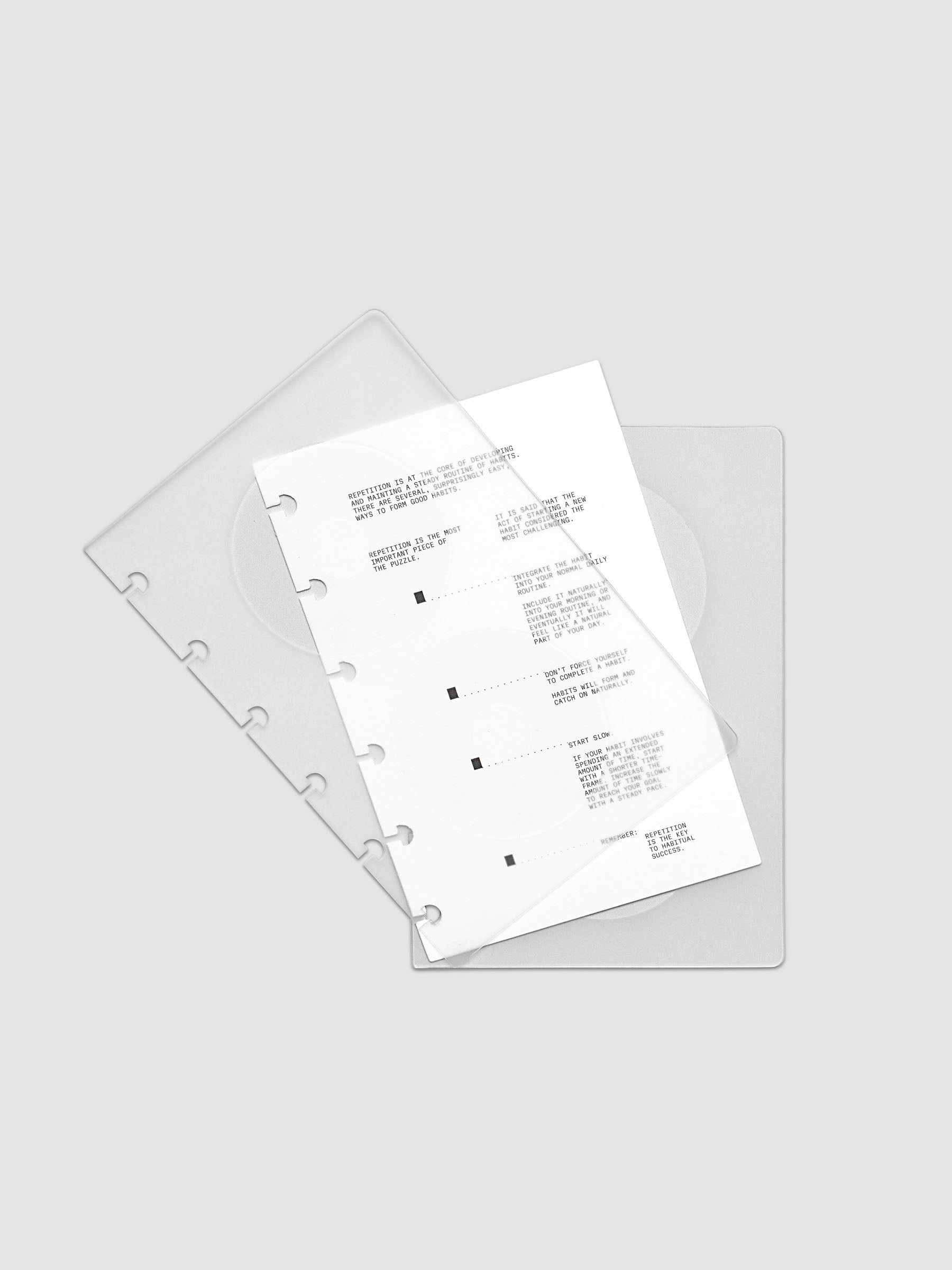 On Repeat Planner Cover + Dashboard Set shown fanned out in size CP Petite, pre-punched for discbound notebooks and planners.