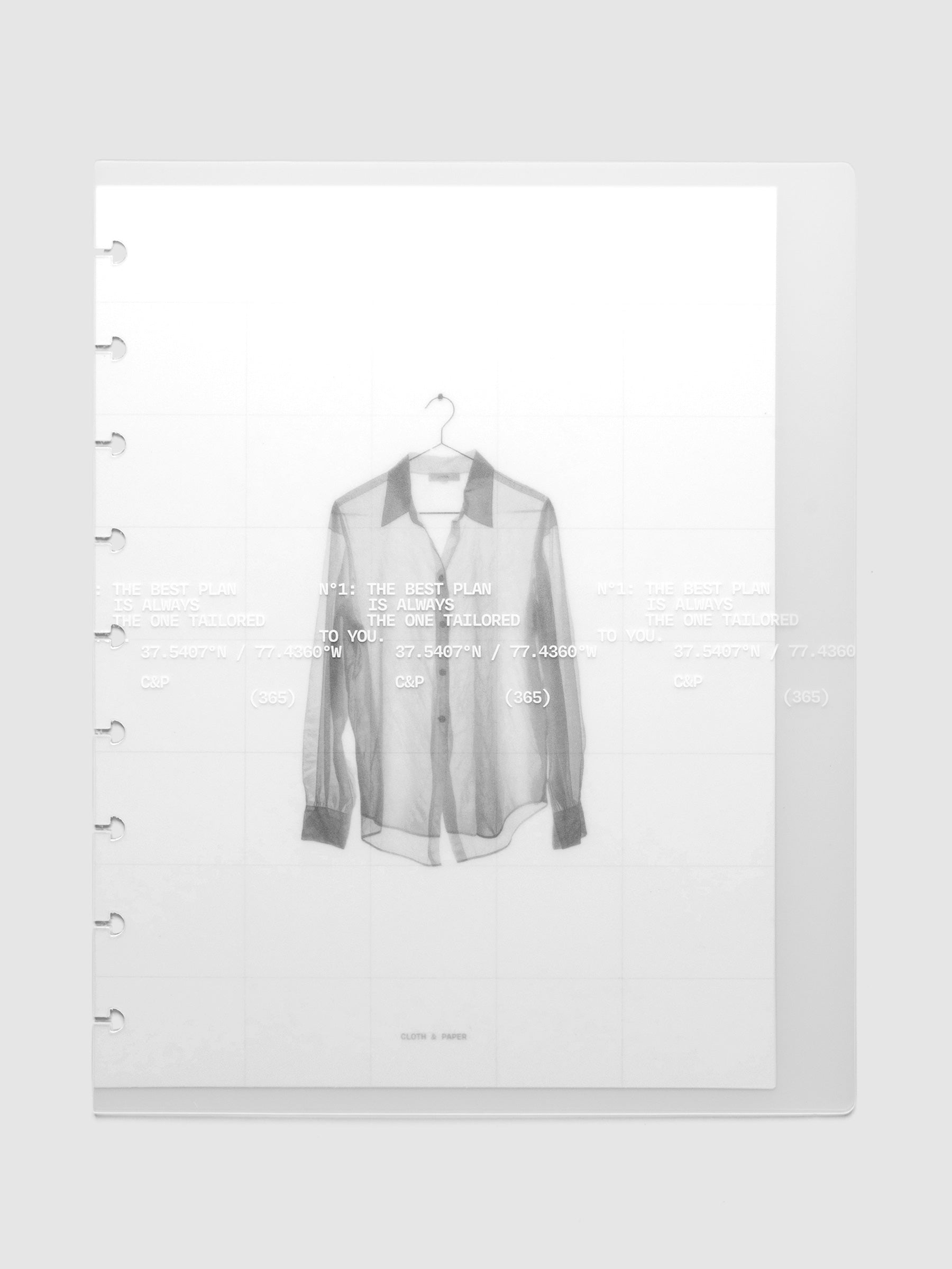 Transparent planner cover set with white printed text design and accompanying black and white dashboard with an image of a tailored shirt on a hanger. Pre-punched for 9-disc planners shown in size HP Classic.