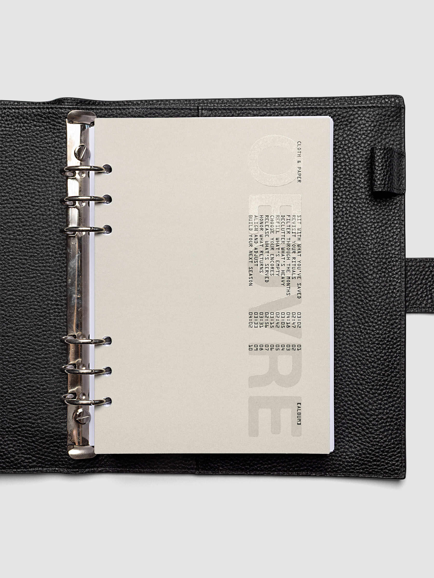 Oeuvre Planner Dashboard in A5 6-Ring Punch size shown in a planner