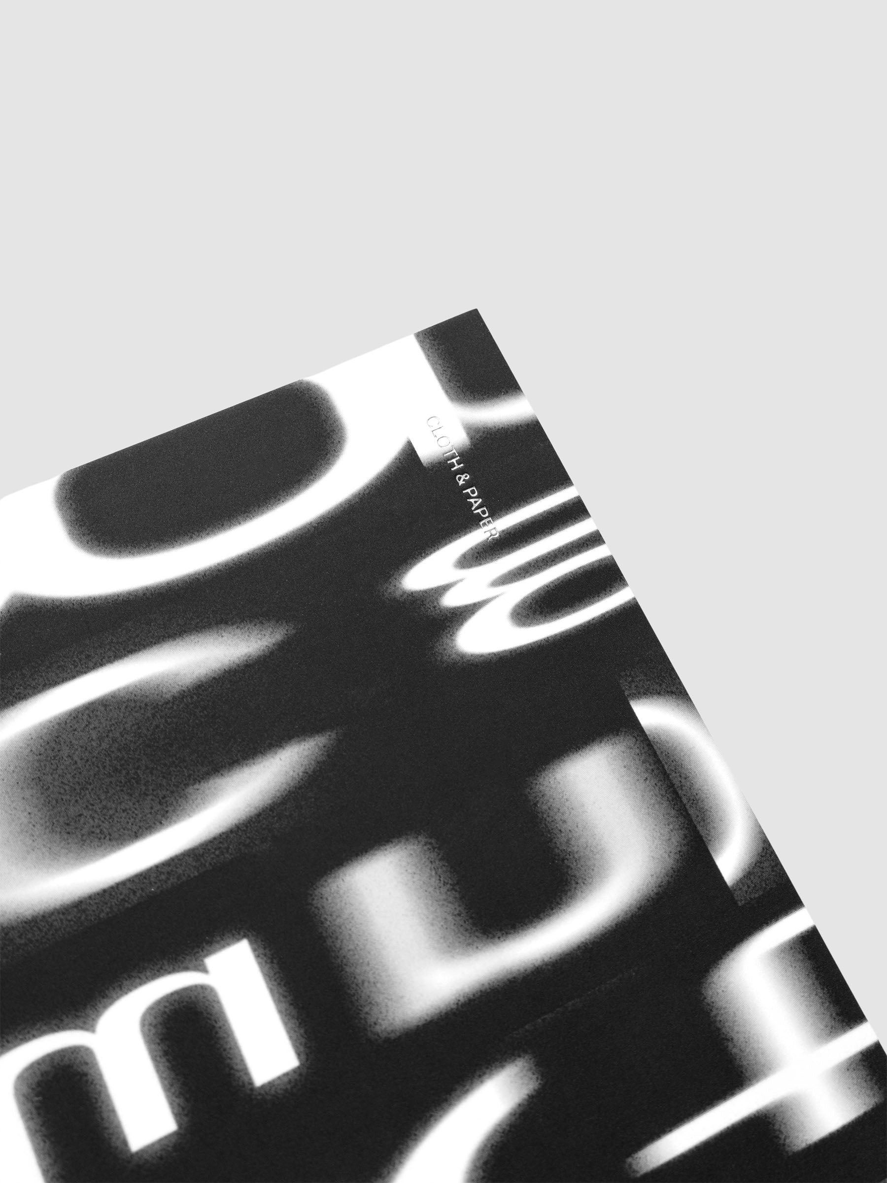 Detail view of the Spiral Notebook dashboard in the pattern Blurred Letters shown in size A5 against a neutral background.