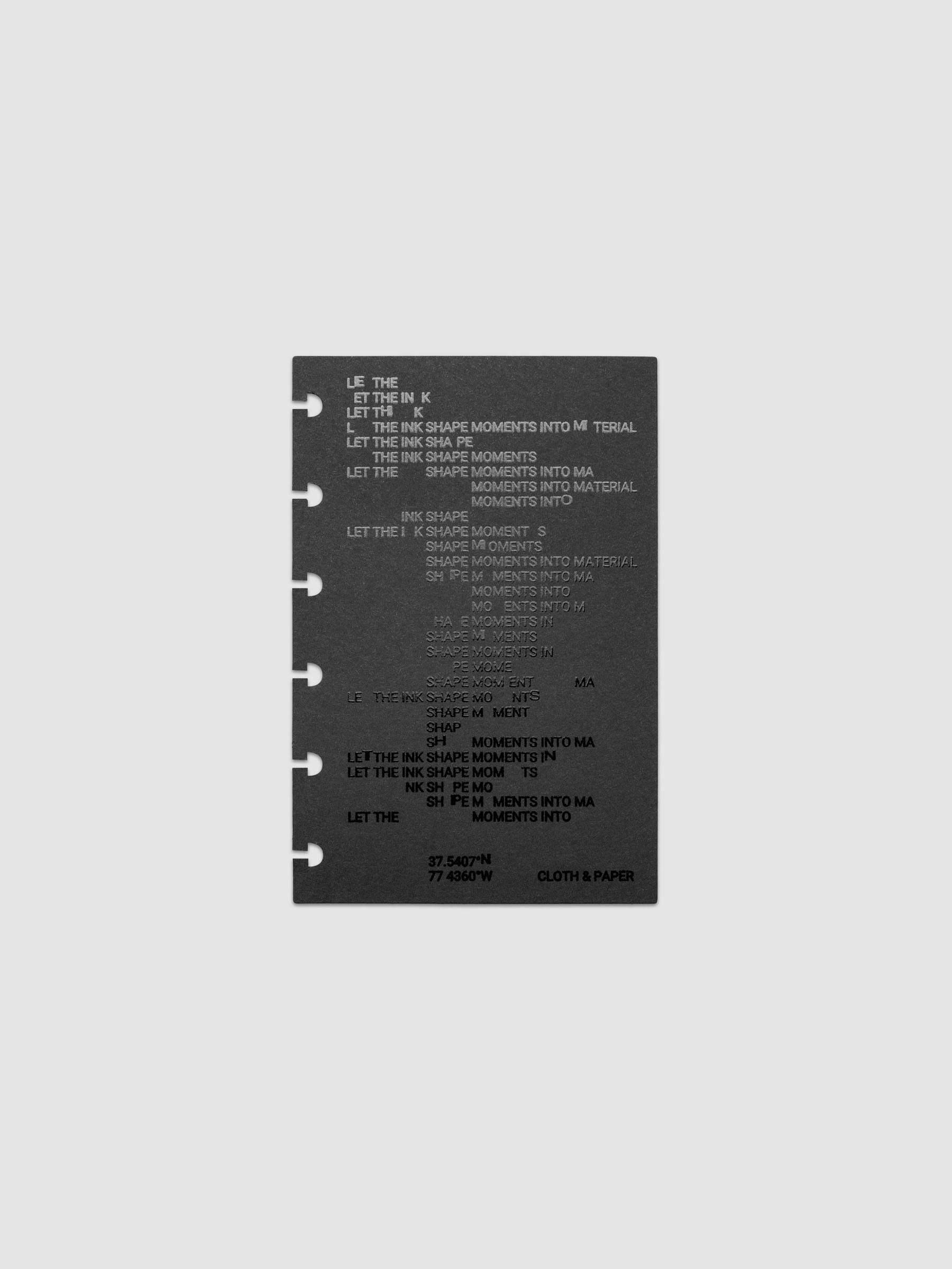 Black dashboard from the Ink Blot Planner Dashboard Duo on a neutral background in size CP Petite, pre-punched for discbound planners.