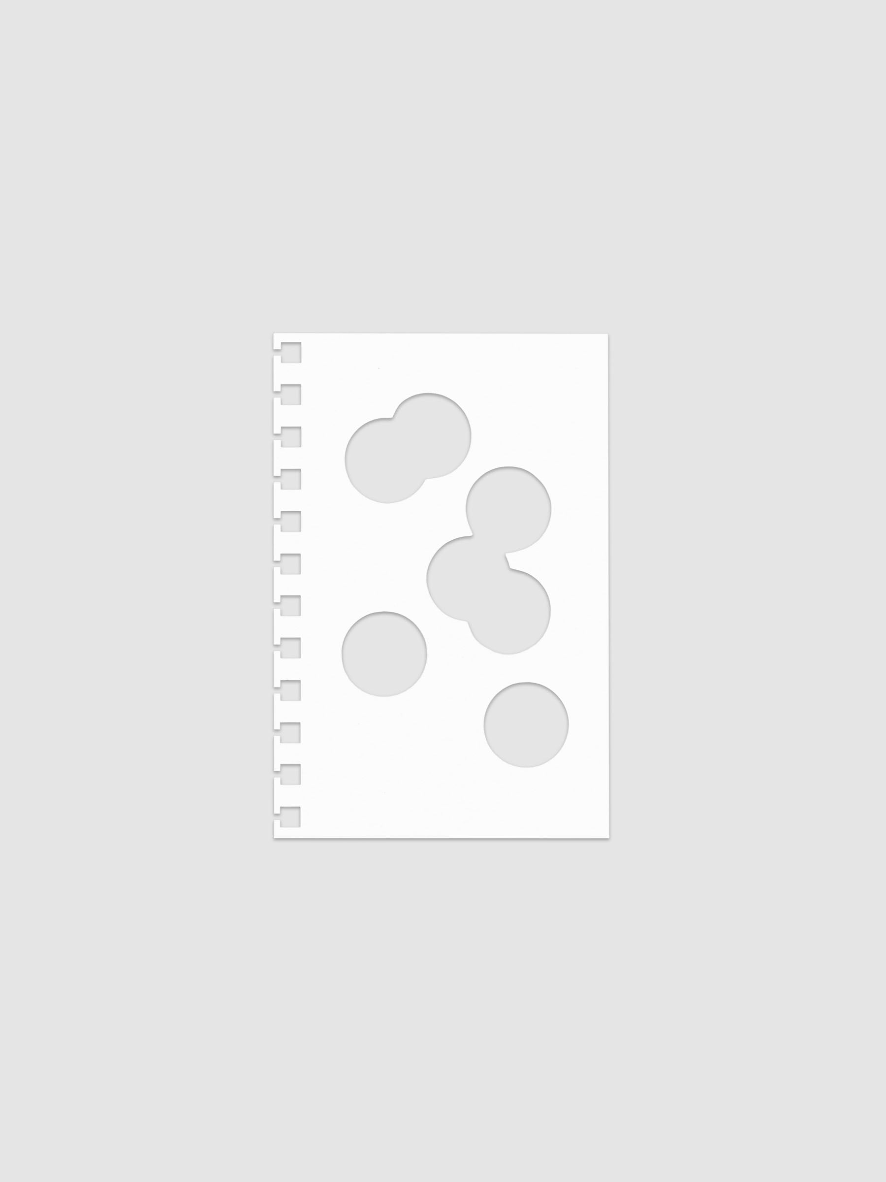 White dashboard from the Ink Blot Planner Dashboard Duo on a neutral background in size CP Petite Spiral, pre-punched for spiral planners.