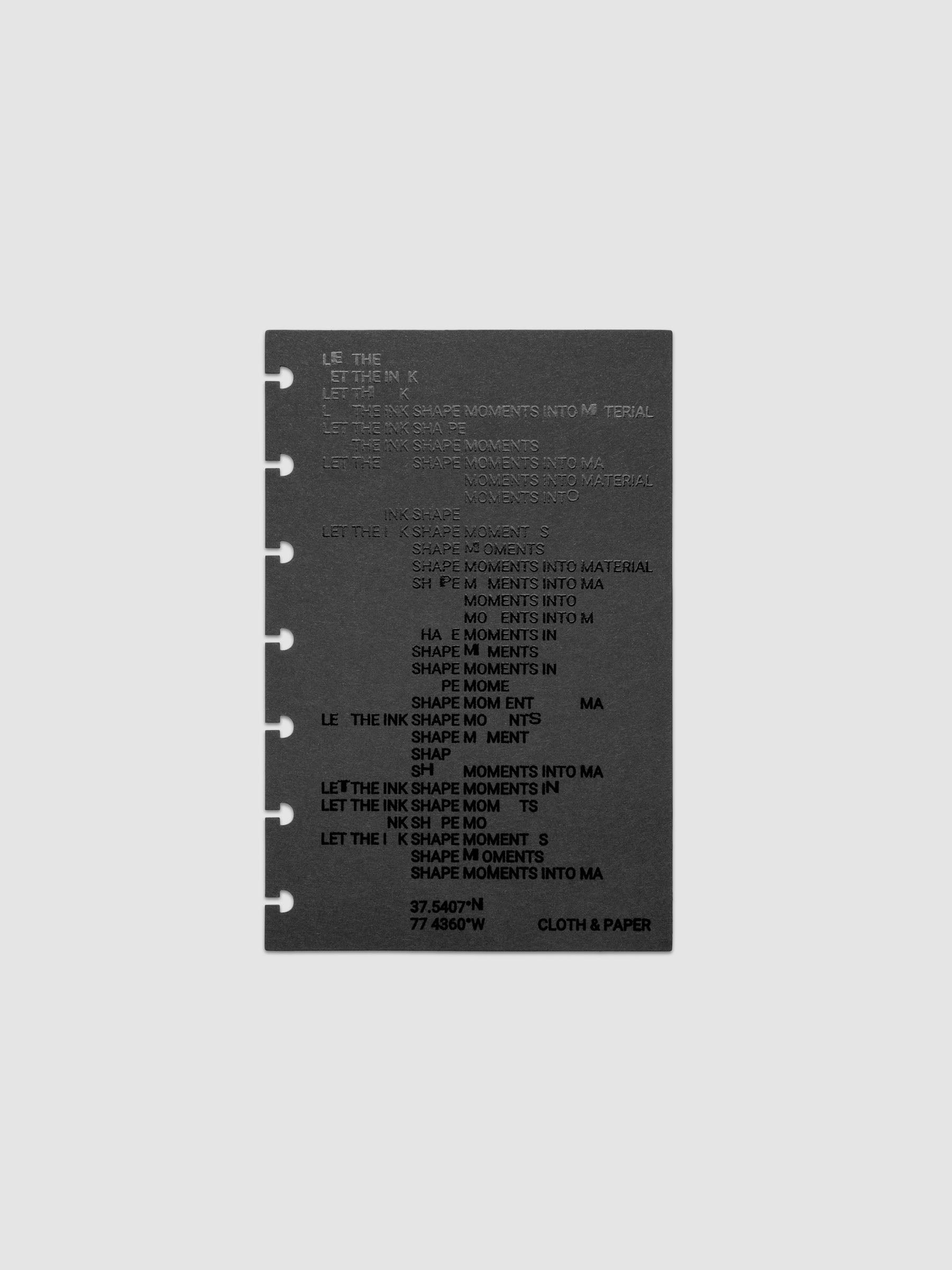 Black dashboard from the Ink Blot Planner Dashboard Duo on a neutral background in size HP Mini, pre-punched for discbound planners.