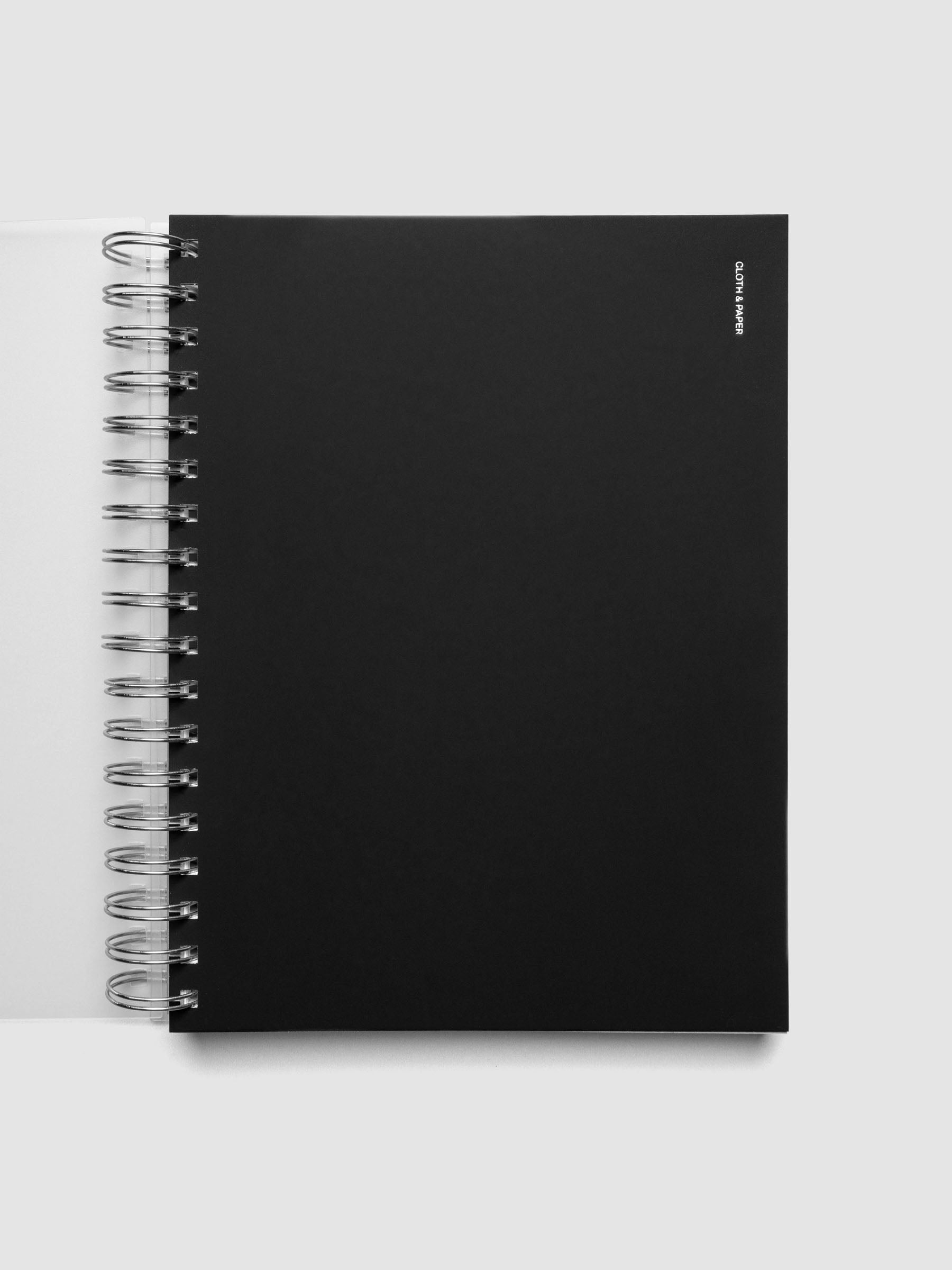Spiral Notebook dashboard in the color Avant Garde shown in size HP Classic inside a notebook.