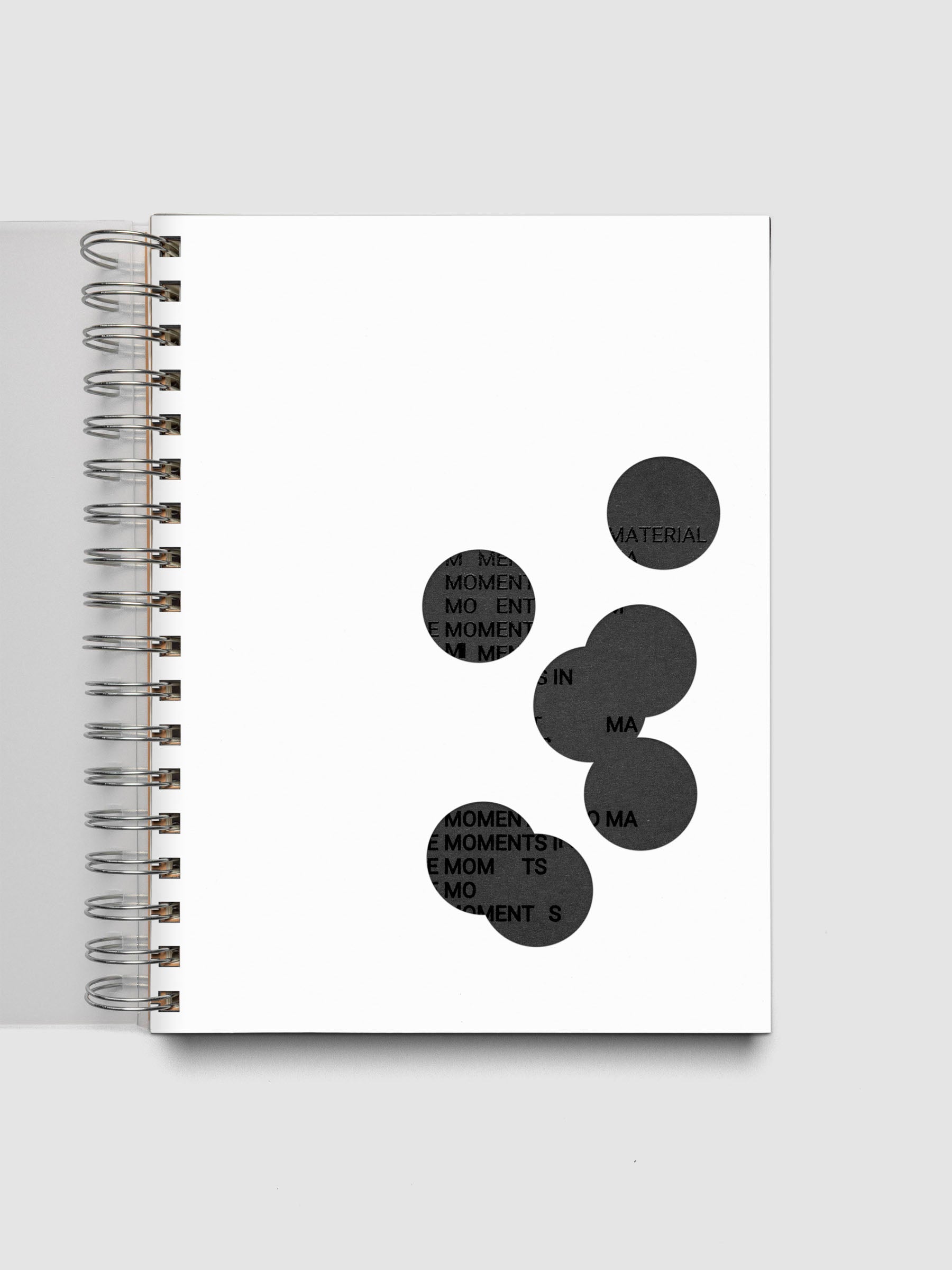 Black and white Ink Blot Planner Dashboard Duo shown layered in a spiral notebook in size HP Classic Spiral.