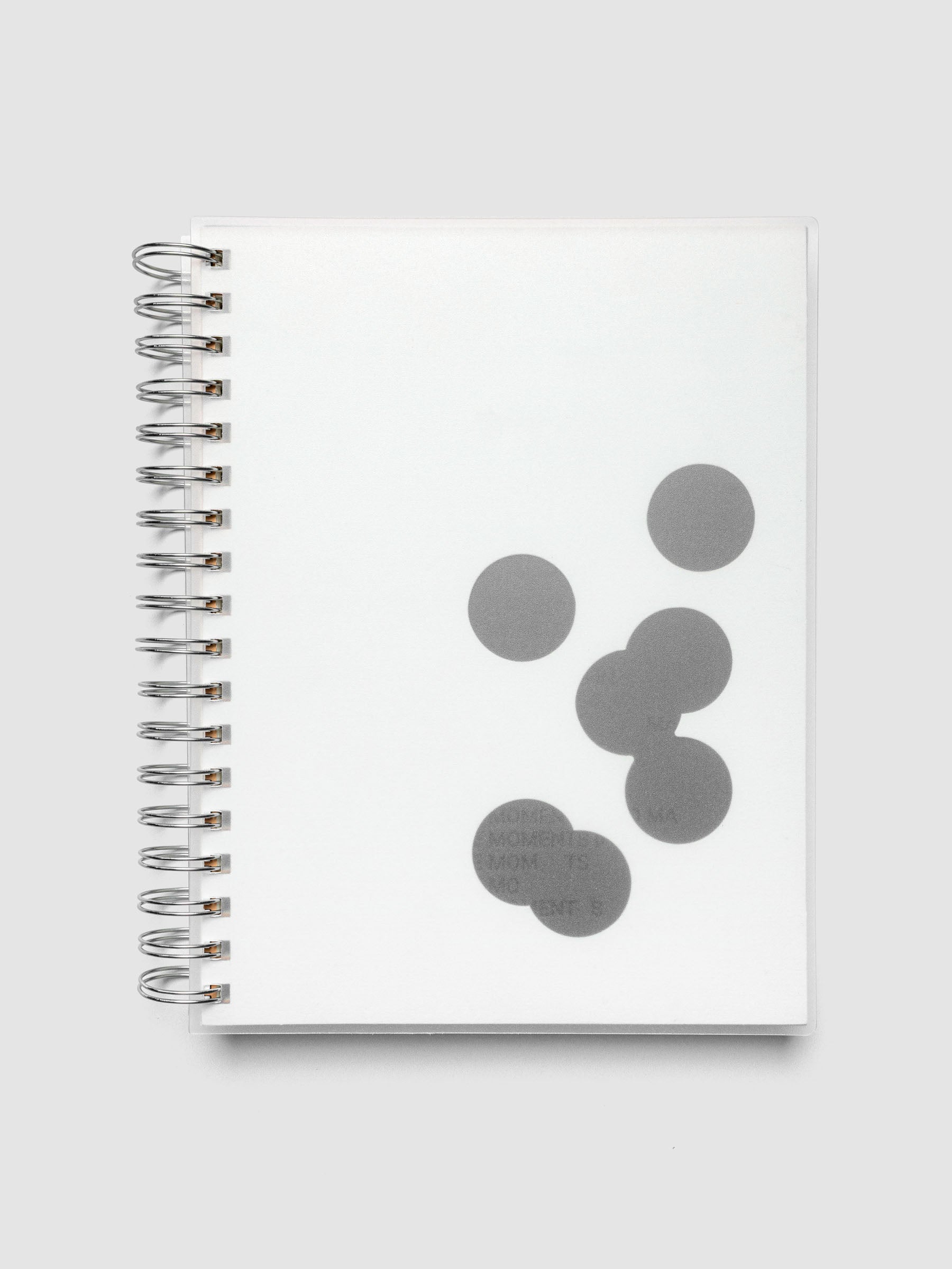 Black and white Ink Blot Planner Dashboard Duo shown layered in a spiral notebook in size HP Classic Spiral.