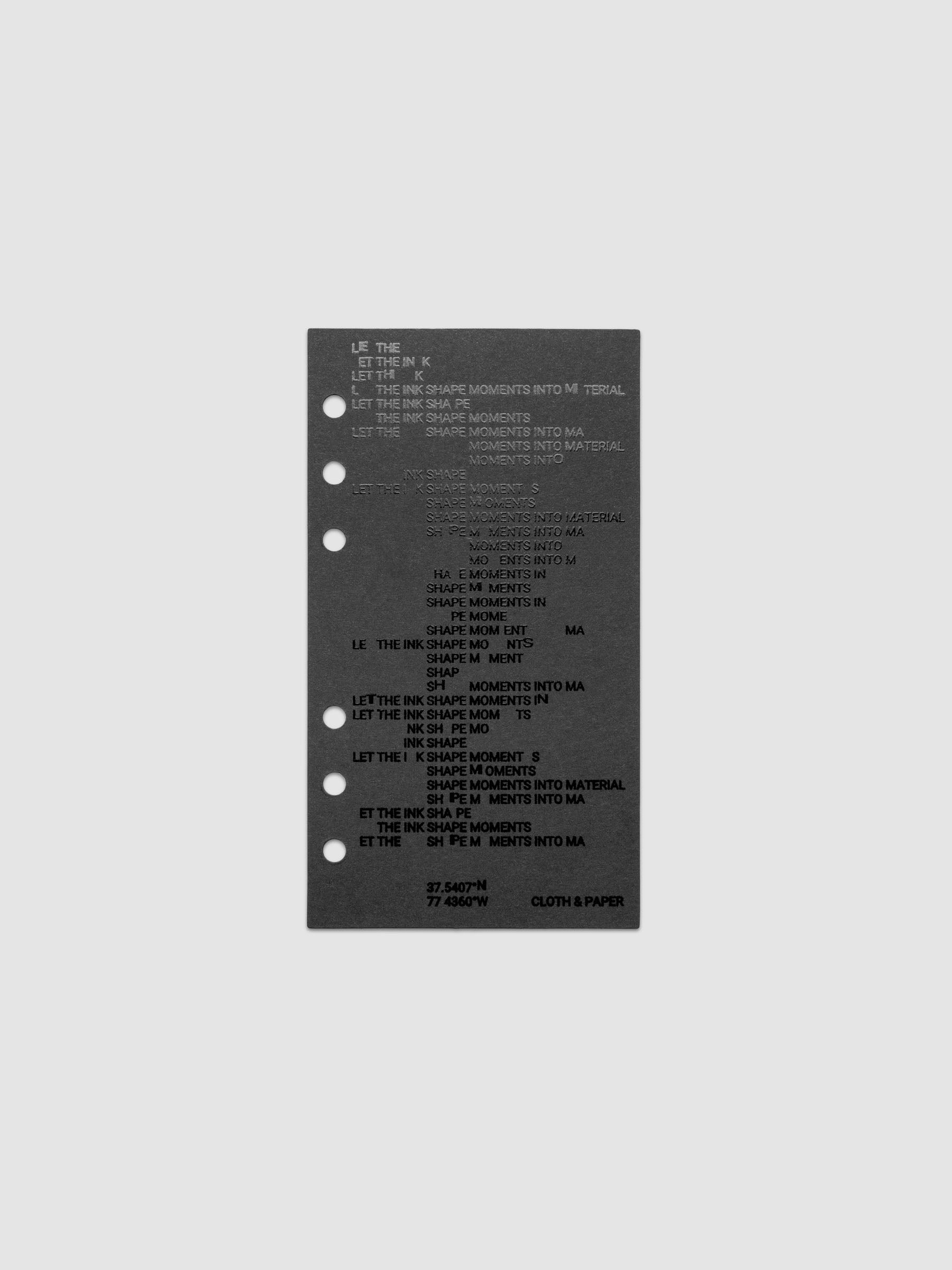 Black dashboard from the Ink Blot Planner Dashboard Duo on a neutral background in size Personal, pre-punched for 6-ring planners.