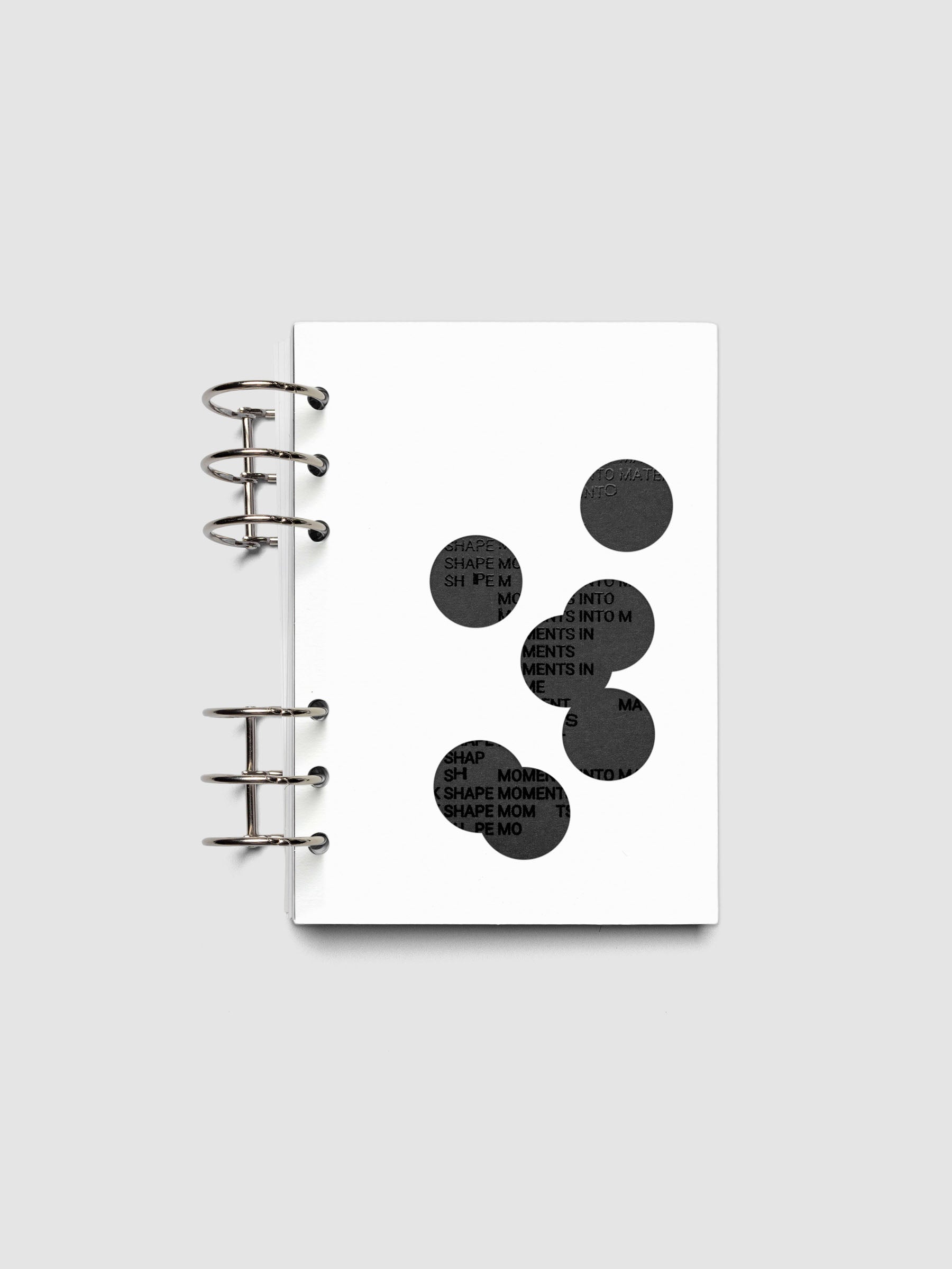 Black and white Ink Blot Planner Dashboard Duo shown layered and ring bound in size Personal Wide.