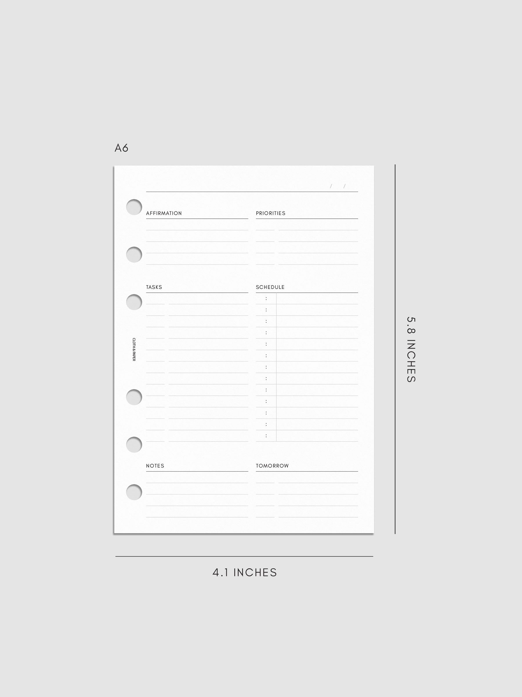 Daily Essentials Planner Inserts digital mockup in size A6, pre-punched for 6-ring binders. Includes headers for affirmations, priorities, tasks, schedule, notes, and tomorrow.