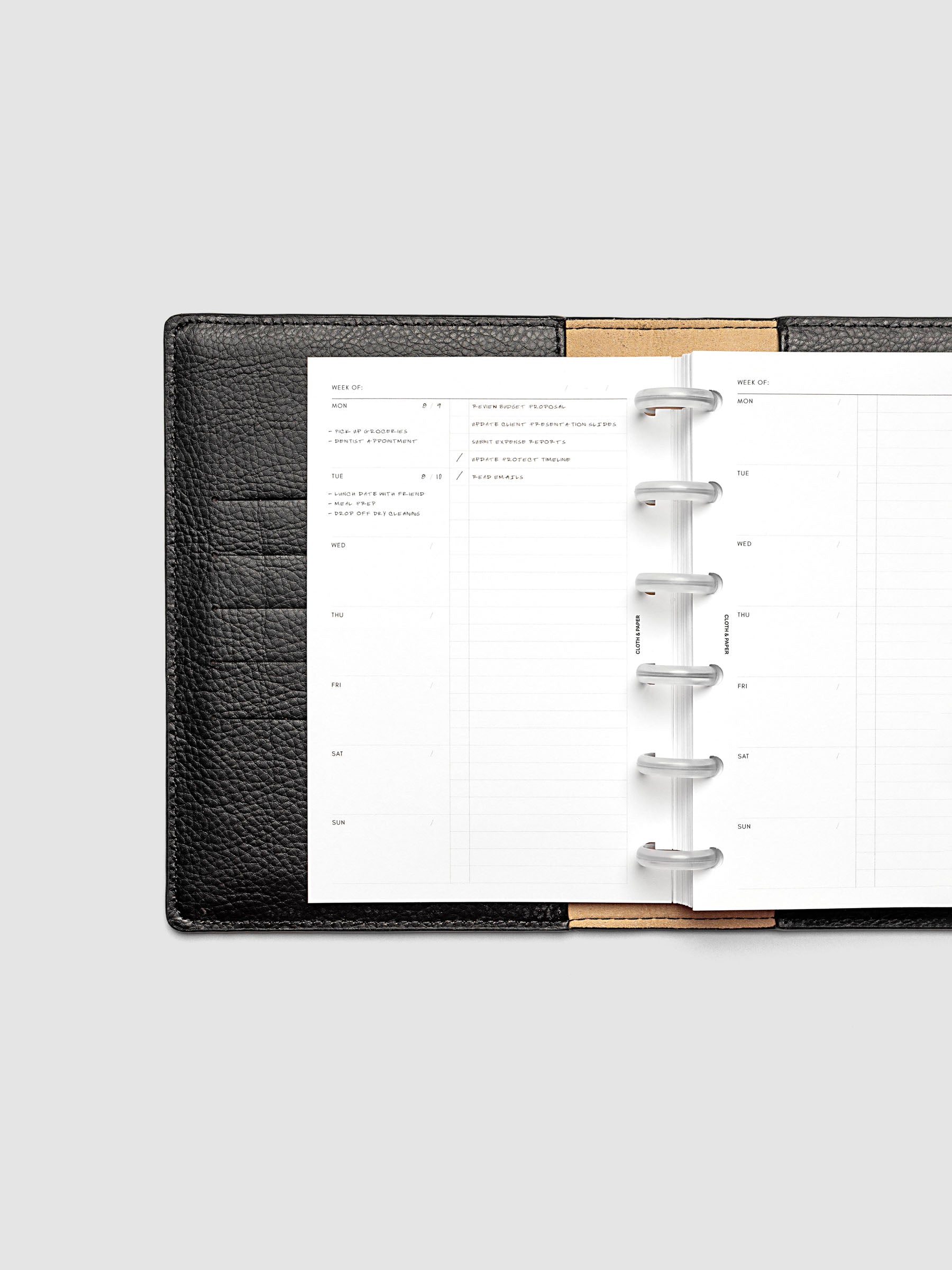 Weekly Checklist Inserts shown discbound in a black folio in size CP Petite.