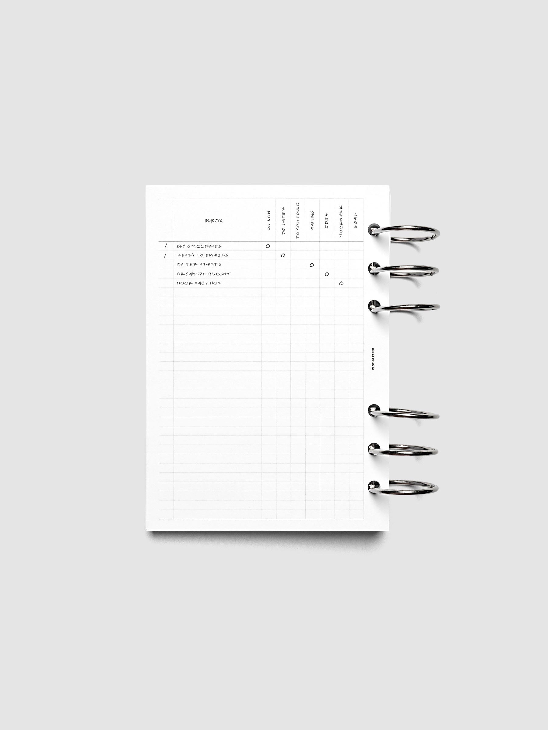 Demo page for Inbox Sorting Planner Inserts shown pre-punched for 6-Ring Personal Wide planners.