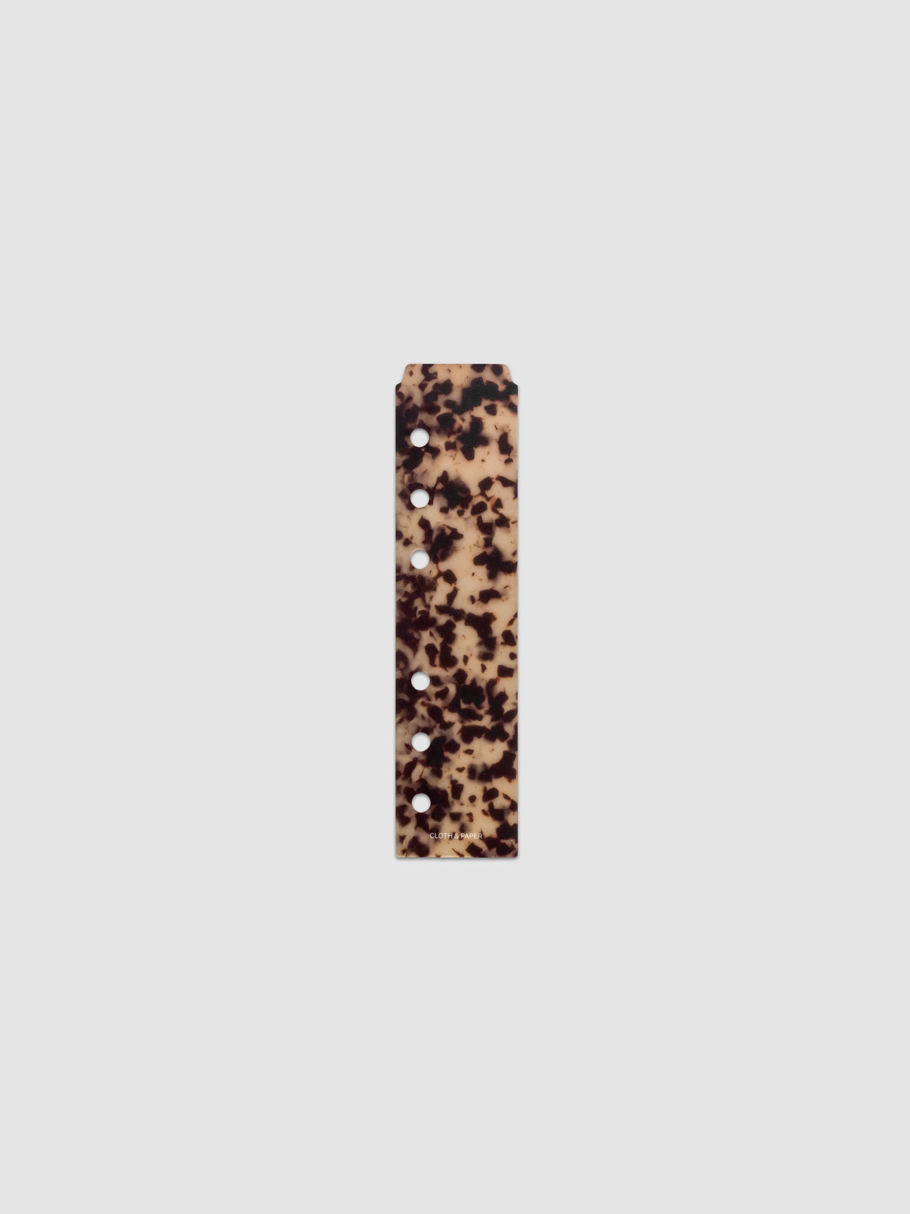 One narrow page marker in tortoiseshell pattern, shown in size A6.