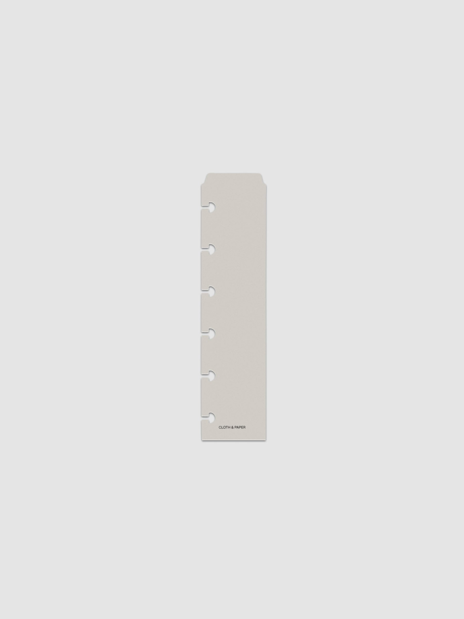 One narrow page marker in grey, shown in size CP Petite.