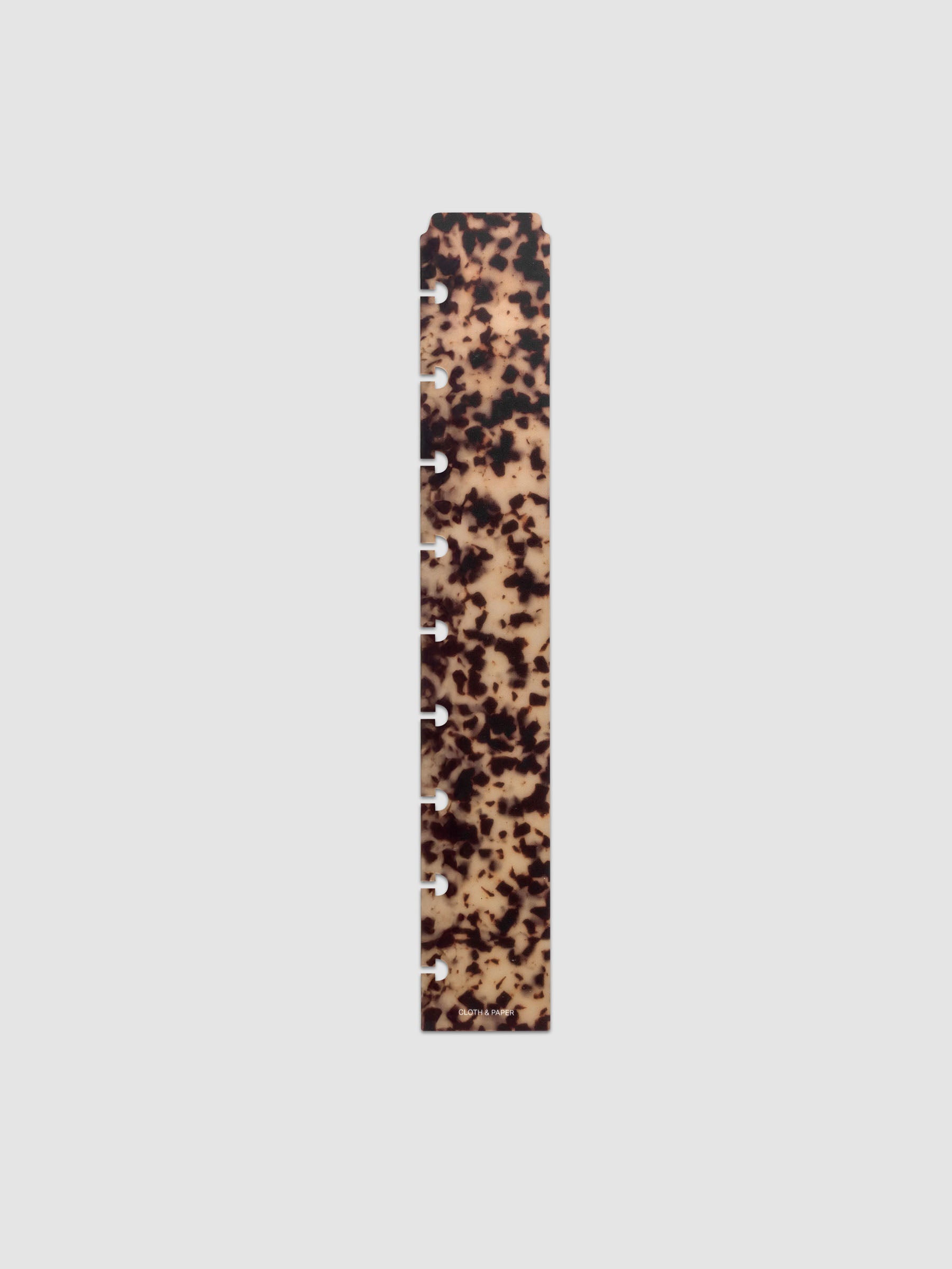 One narrow page marker in tortoiseshell pattern, shown in size HP Classic.
