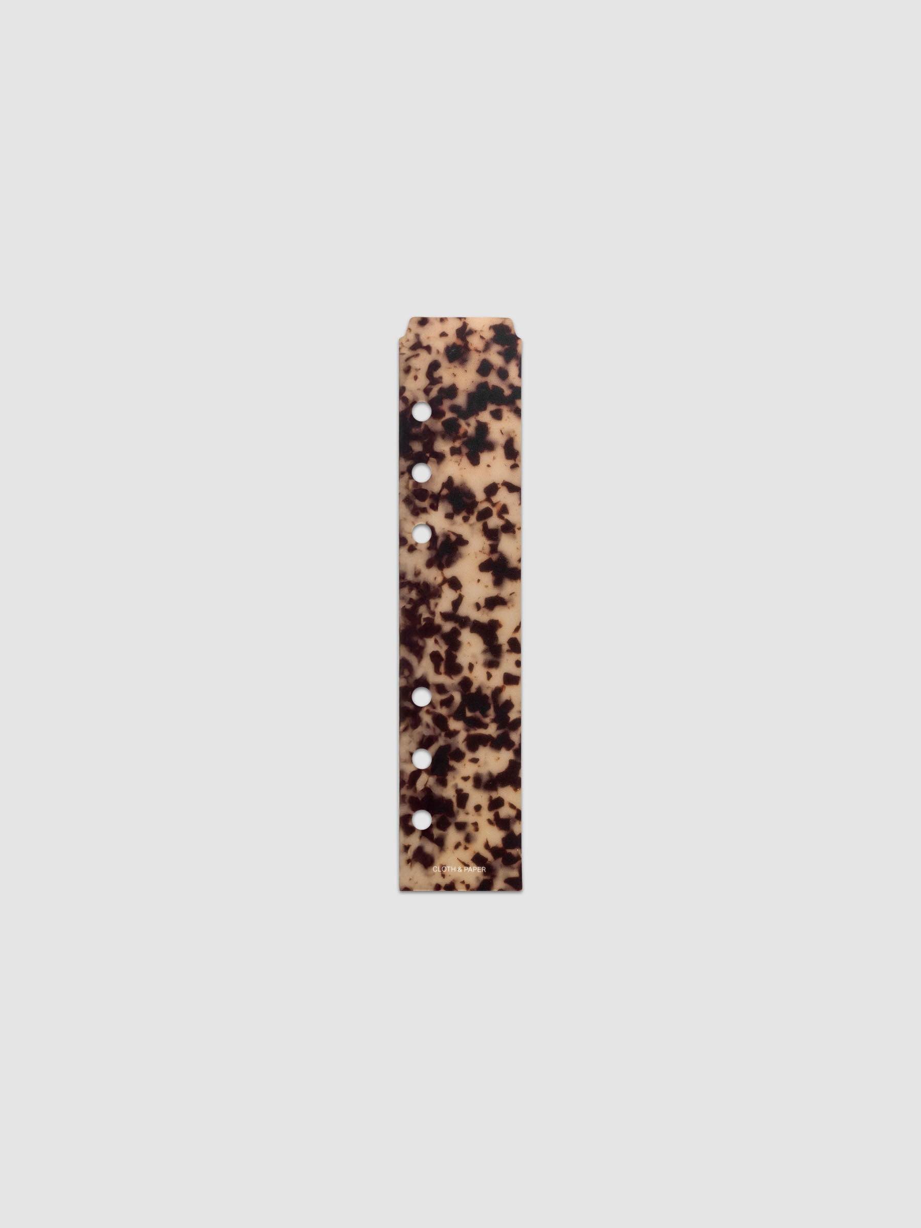 One narrow page marker in tortoiseshell pattern, shown in size Personal/Personal Wide.