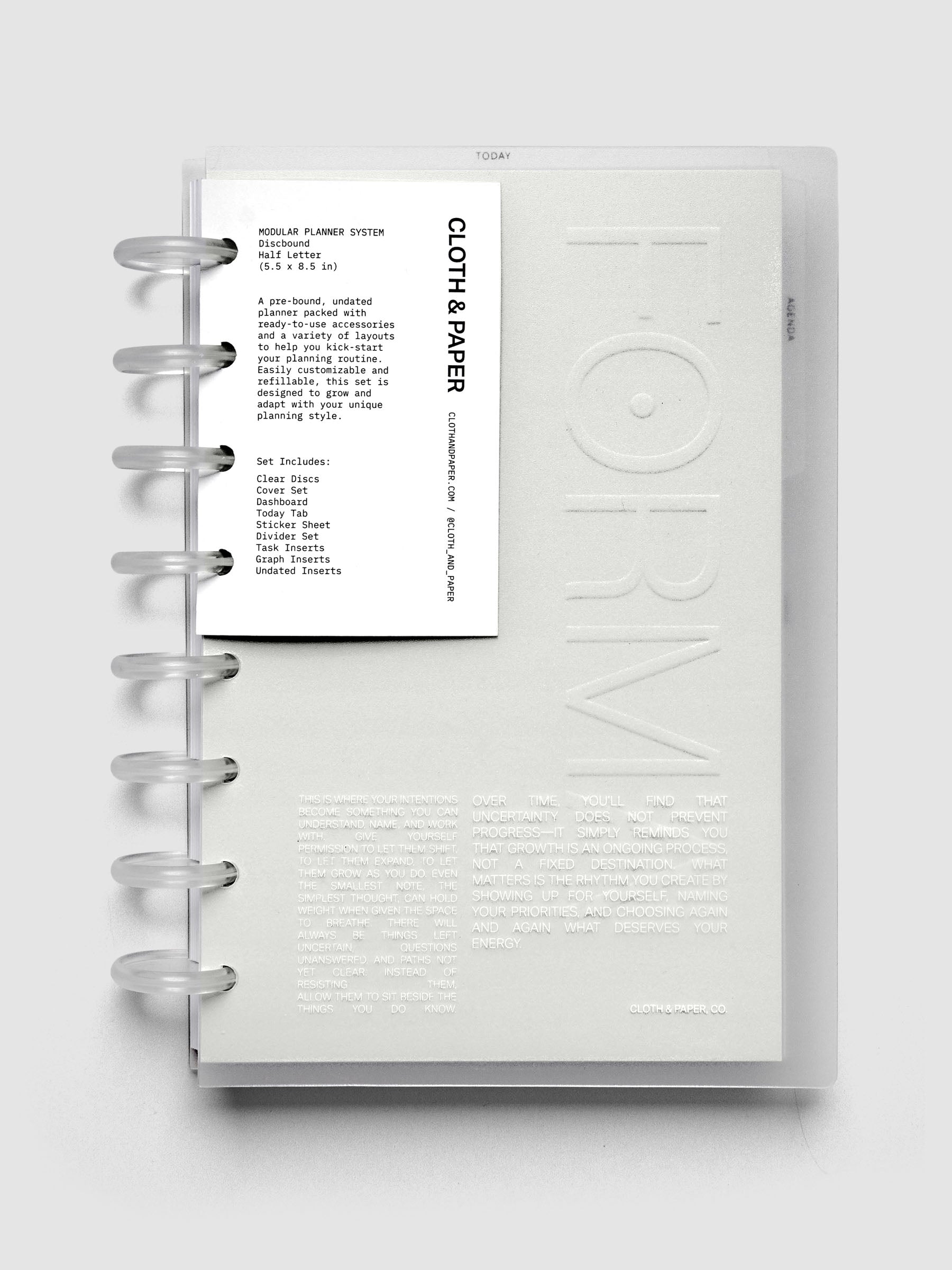 Closed Forma Modular Planner System in Half Letter (top) and open in CP Petite (bottom) against a dark background.