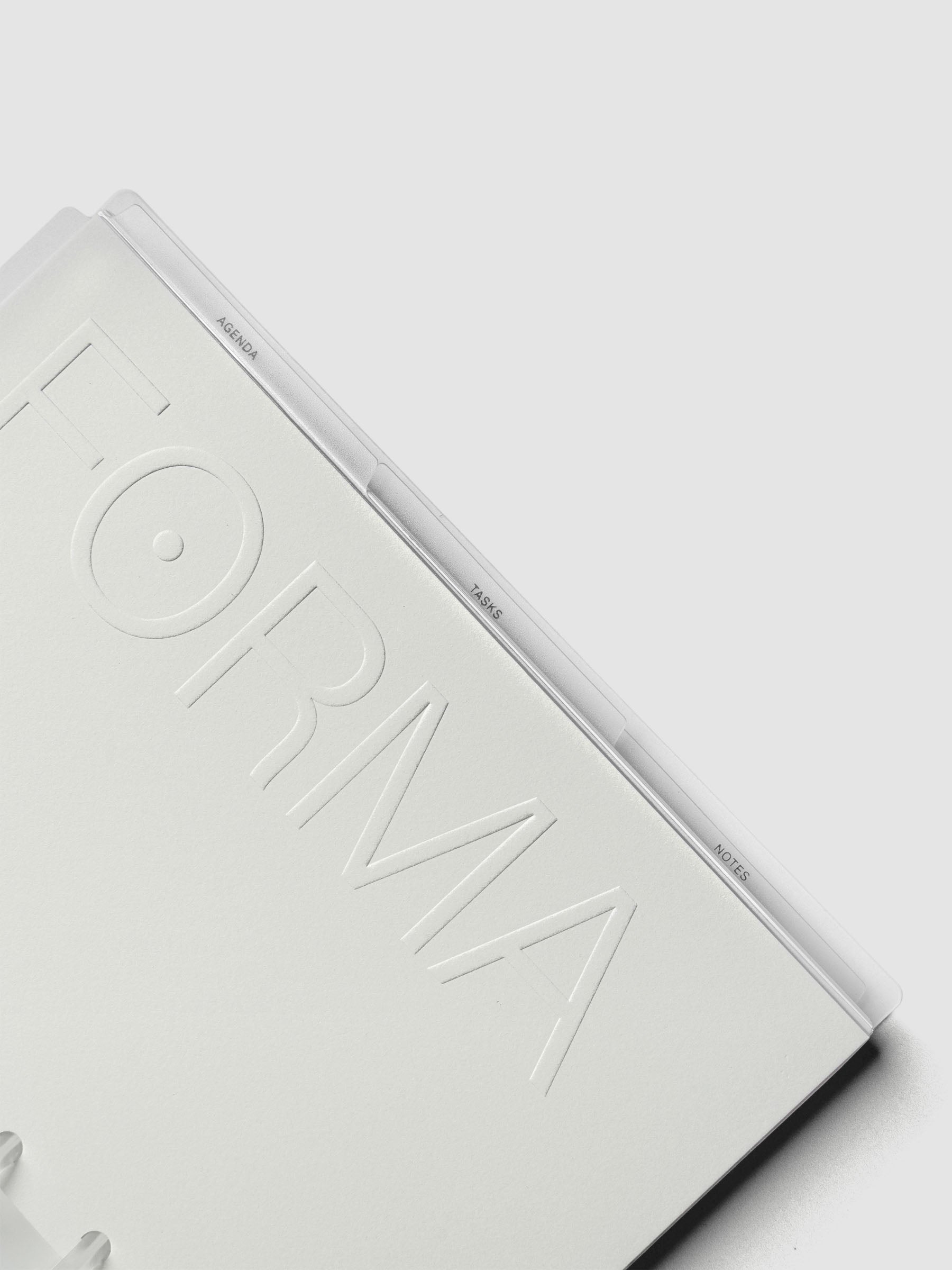 Close up view of the packaging label of the Forma Modular Planner System in Half Letter with details of what's included in the system.