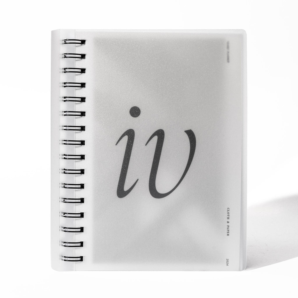 Spiral notebook displayed on a white background.