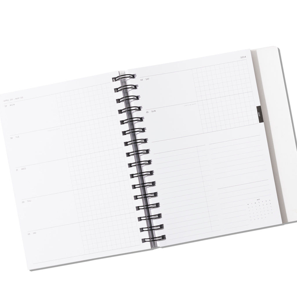 Horizontal Weekly planner displayed open on a white background.