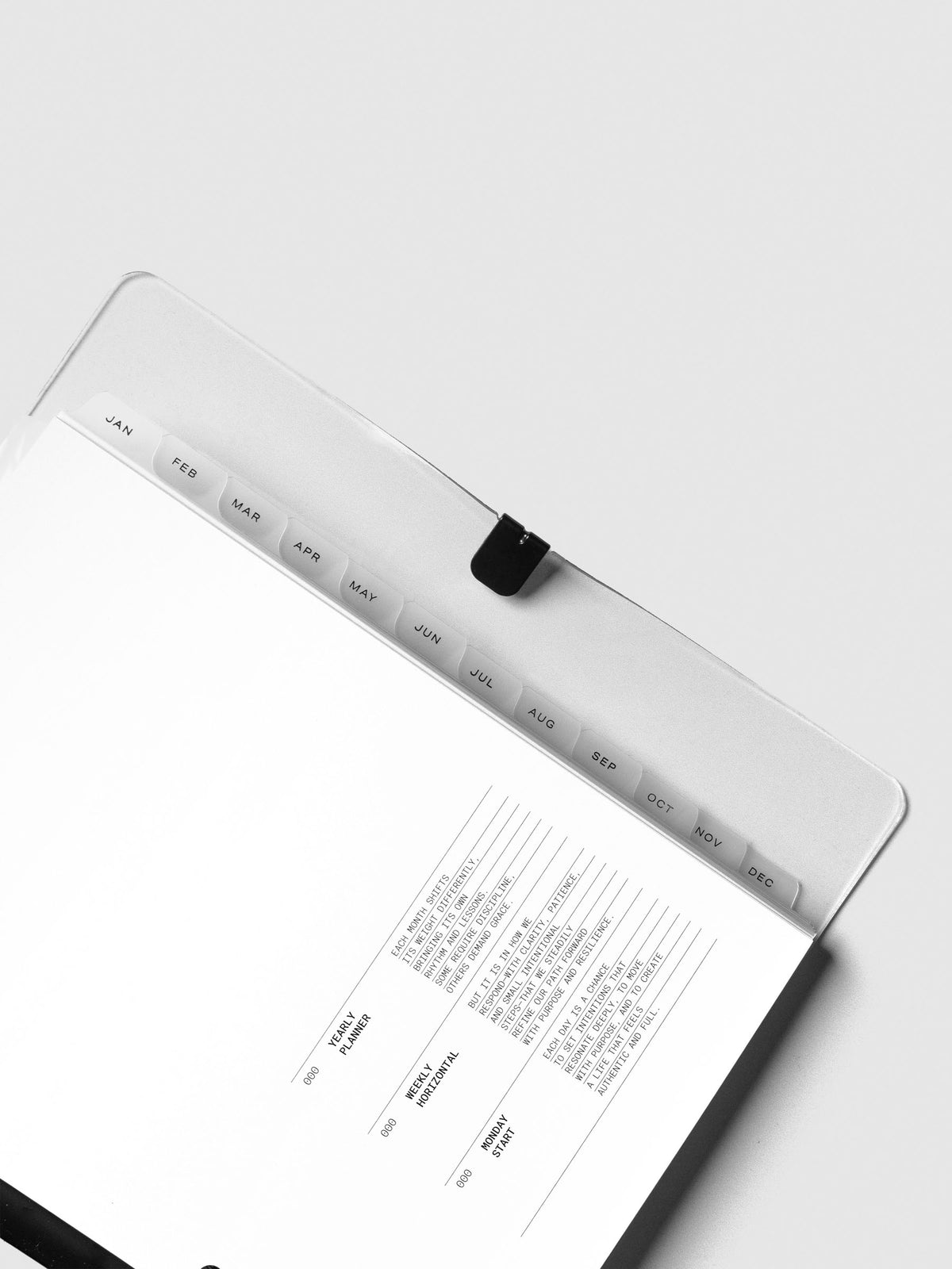 Close up of the monthly side tab dividers included with the 2026 Dated Planner Bundle Horizontal Weekly Monday Start in size A5.