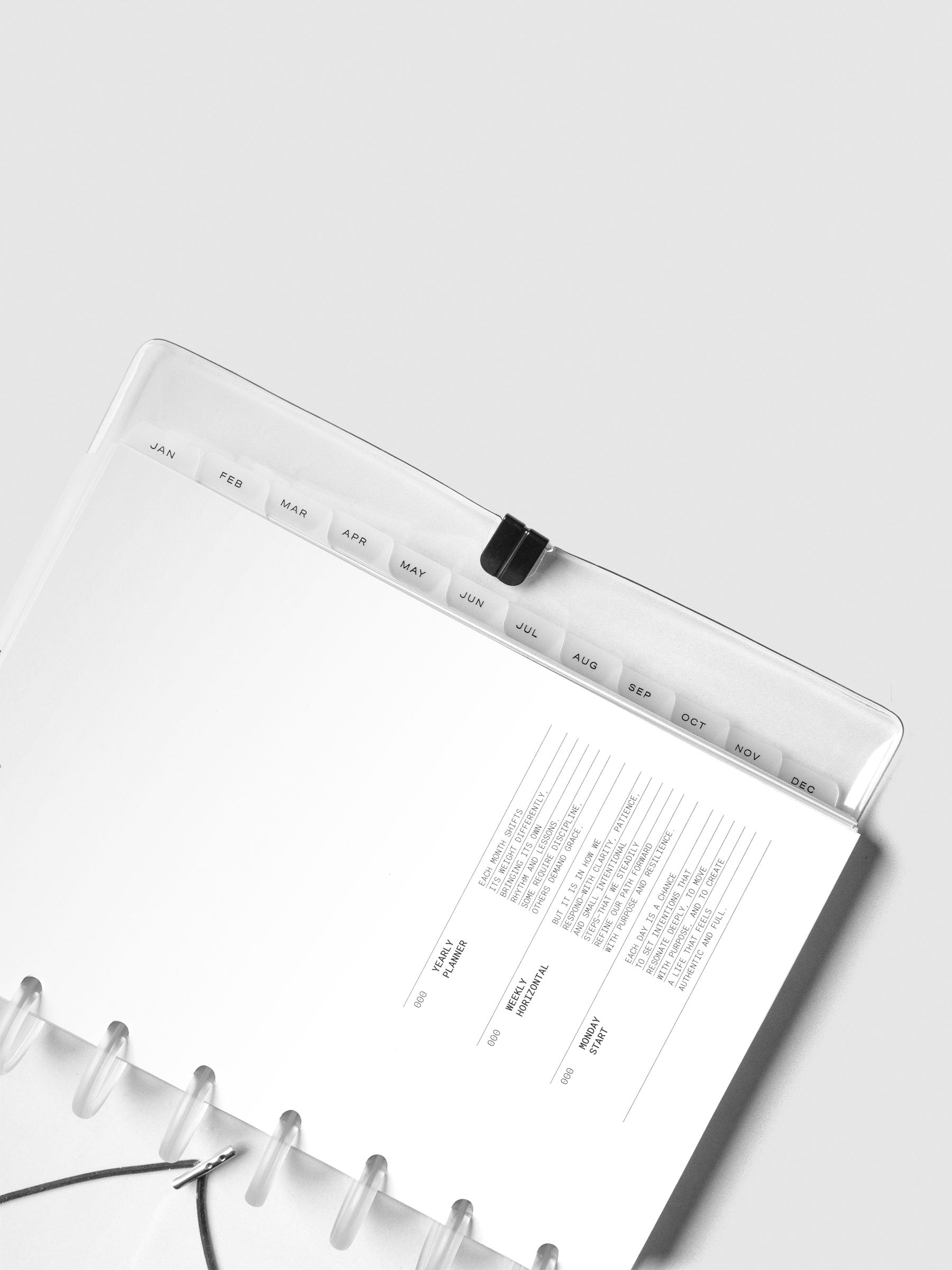 Close up of monthly side tab dividers included with the 2026 Dated Planner Bundle Horizontal Weekly Monday Start in size Half Letter.