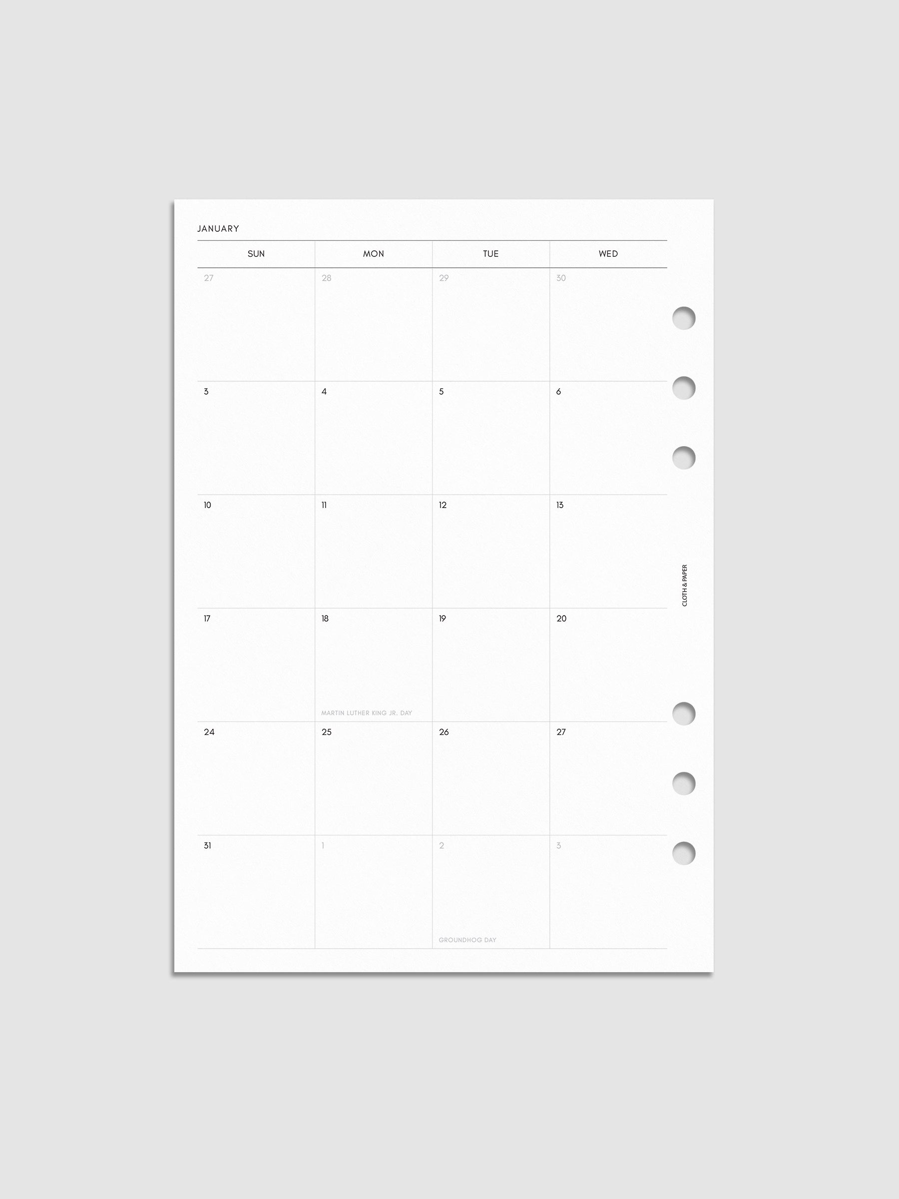 Left page of the 2027 Dated Monthly Sunday Start insert in A5 6-Ring Punch size, showing the dated calendar grid