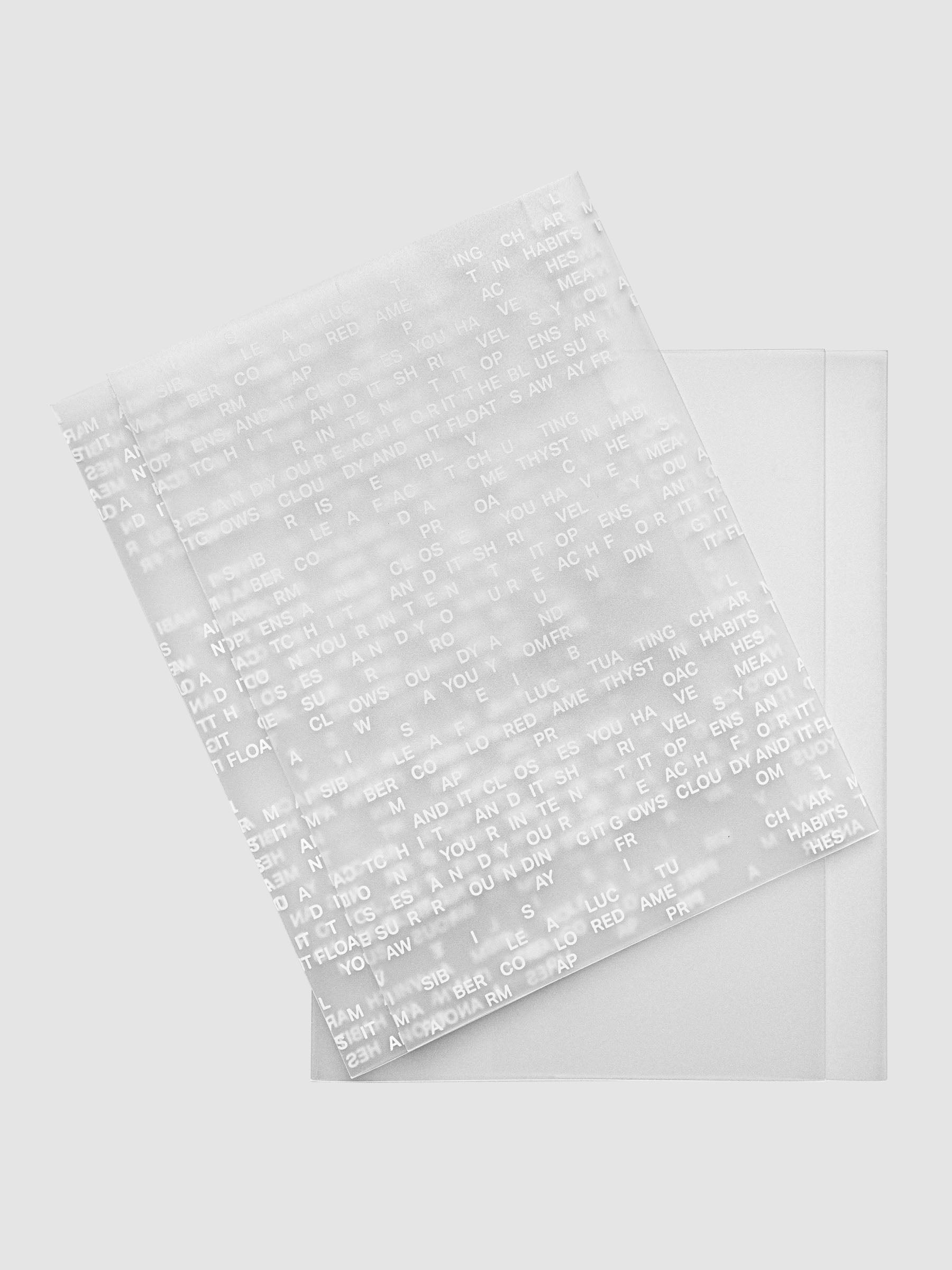 Perfect Bound Notebook Cover Set in size A5 showing Letters cover on top of Le Blanc cover.